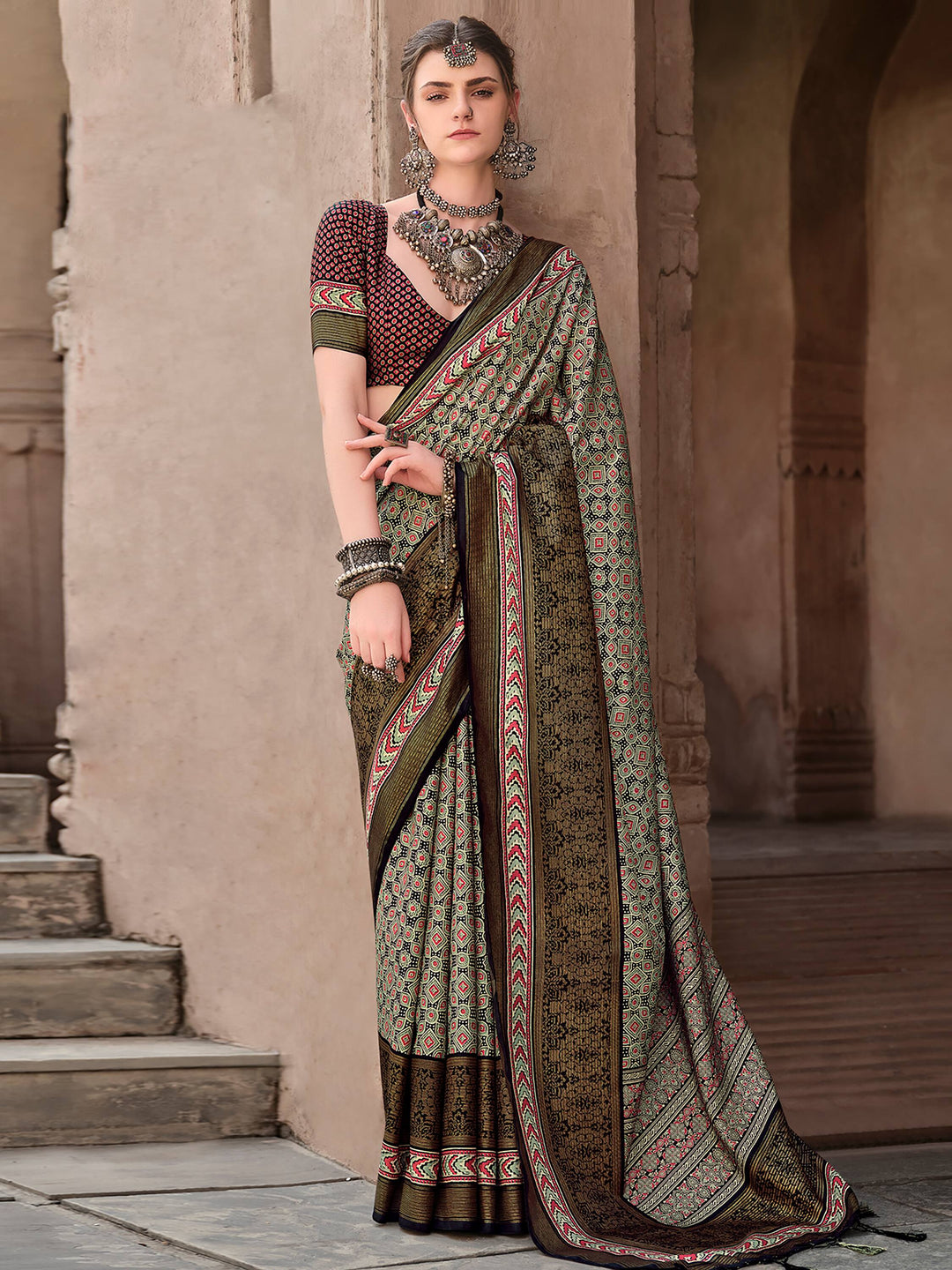 Green silk saree crafted for elegance and style.