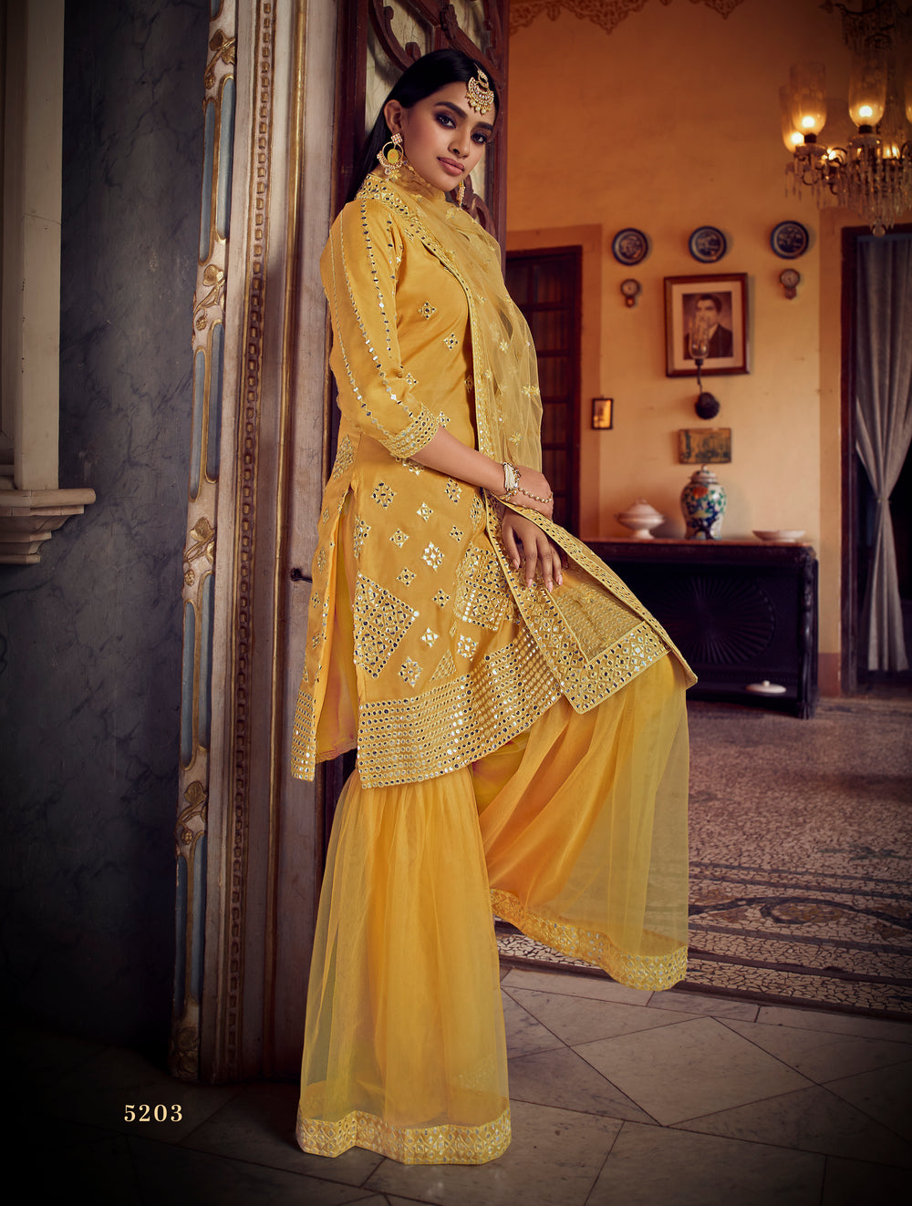 Mustard yellow A-line sharara suit with resham and zari embroidery