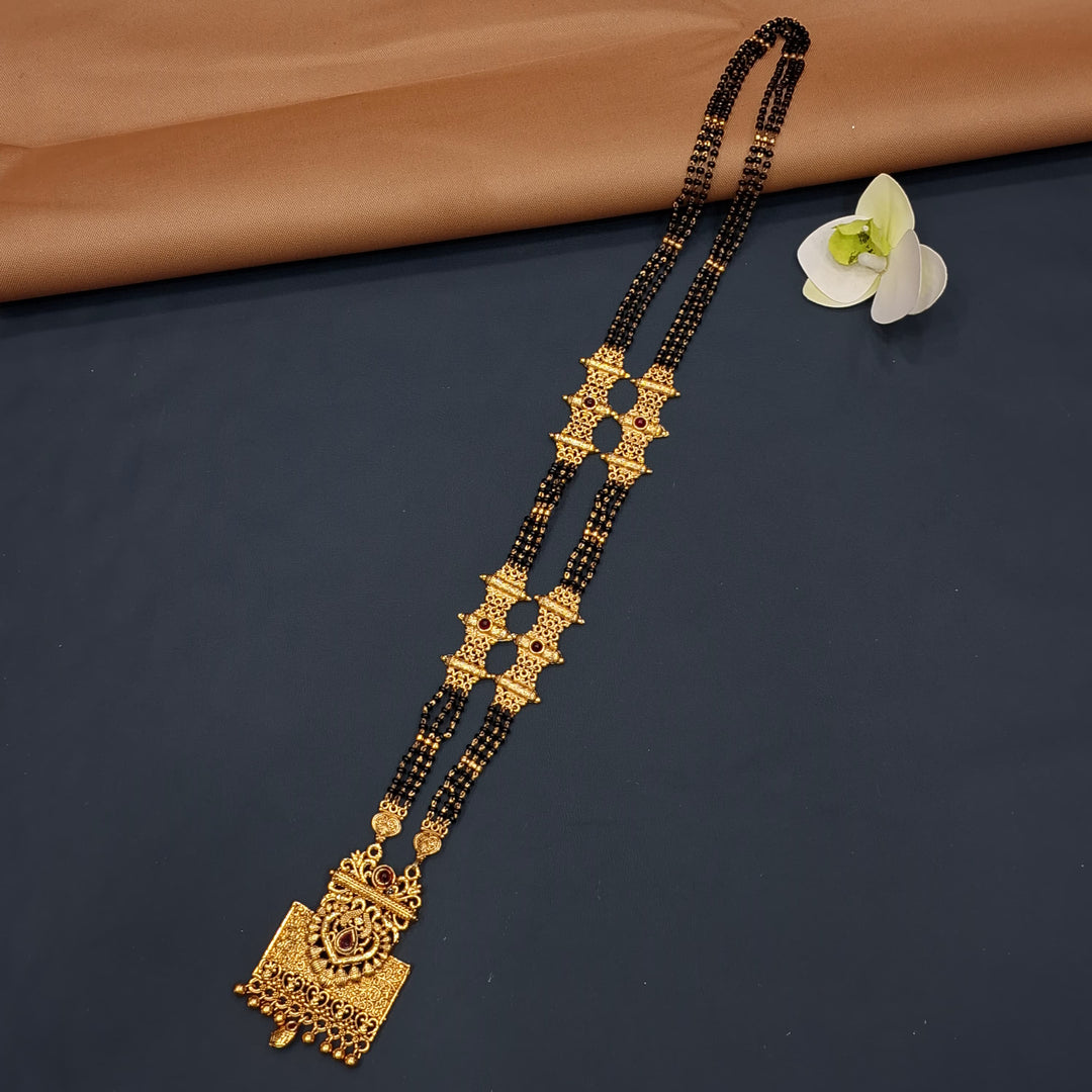 Black and gold mangalsutra necklace in gold-plated alloy, classic style.