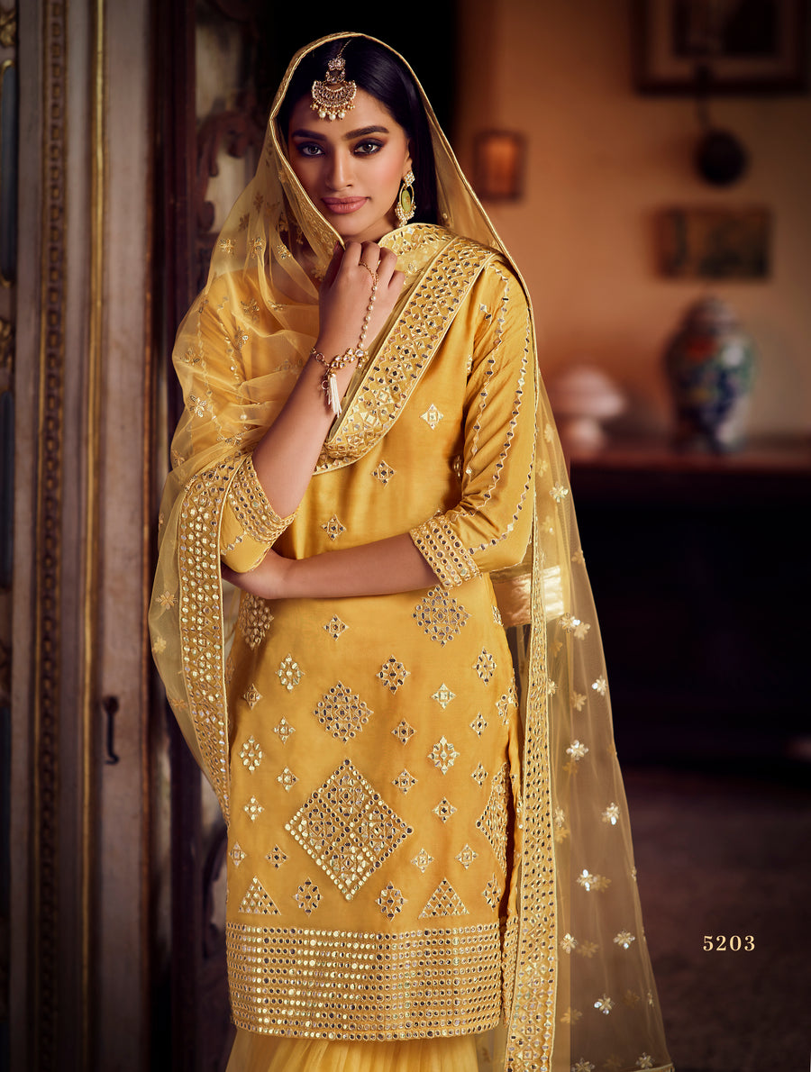 Mirror work mustard yellow sharara outfit with soft net dupatta