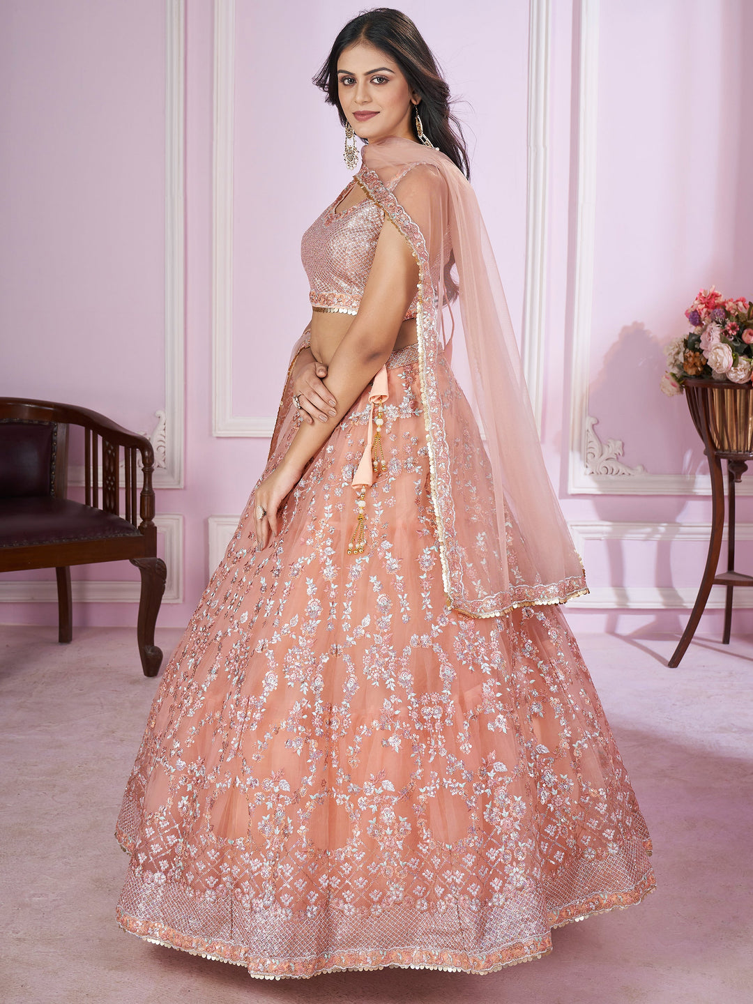 Stunning Peach Sequins Net Bridesmaid Lehenga Choli With Dupatta