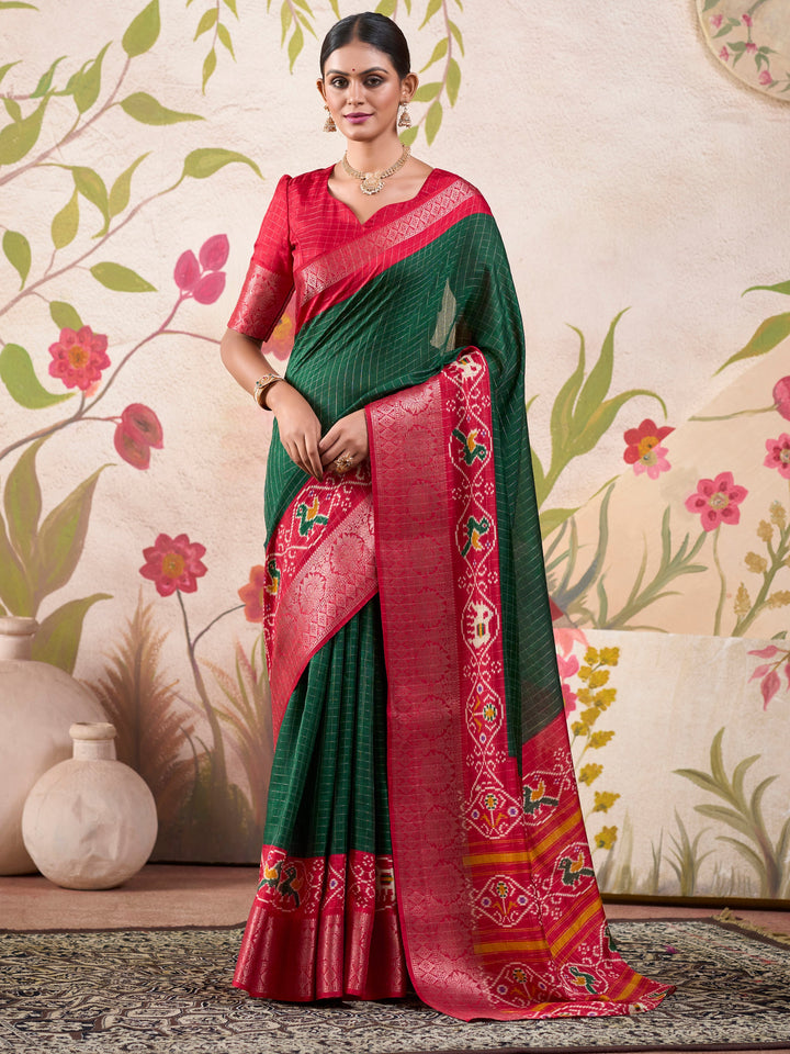 Green silk saree crafted for elegance and style.