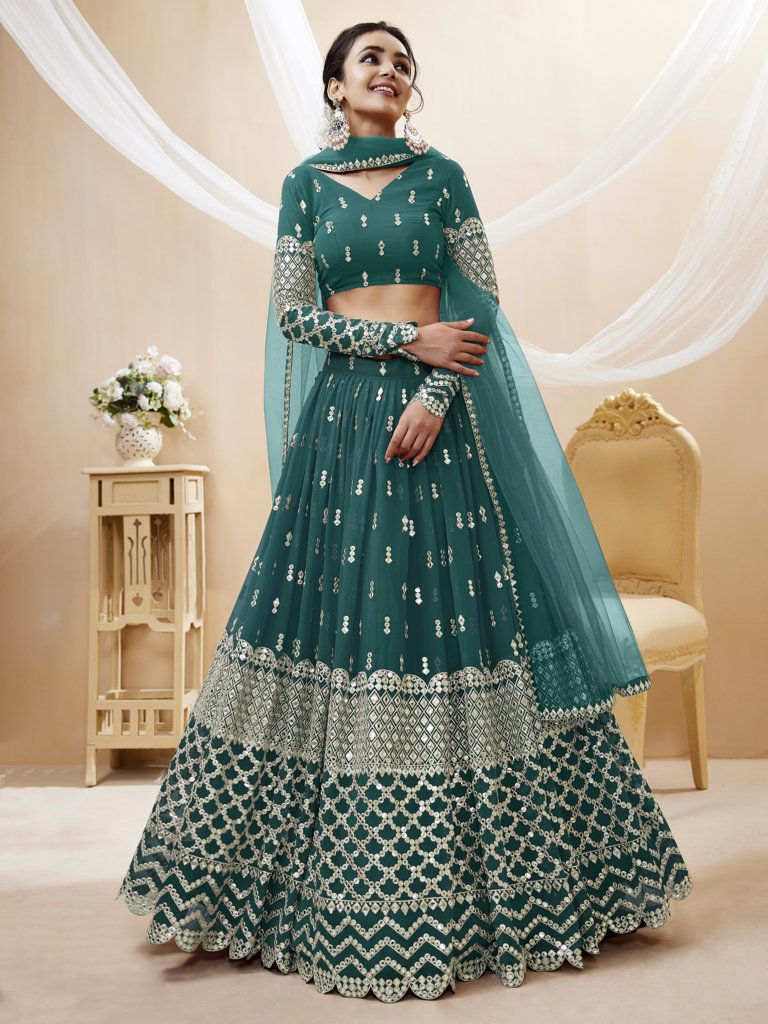 Beautiful teal-blue lehenga choli set with exquisite sequins and zari work, ideal for bridal wear.