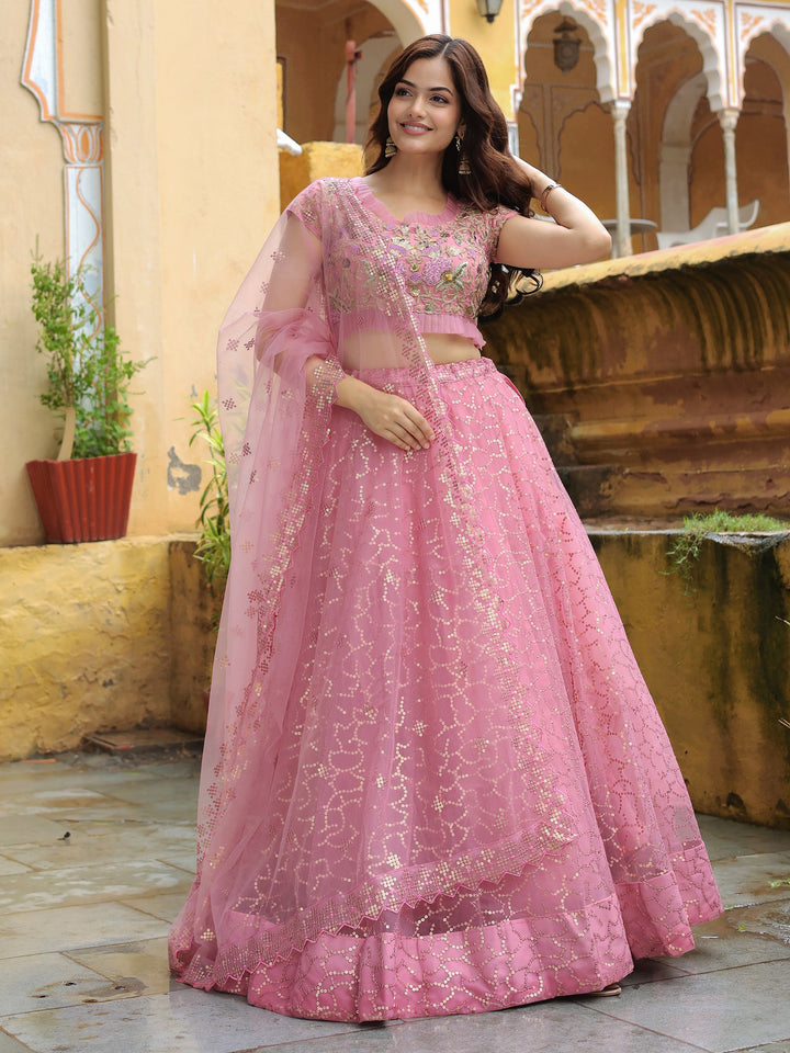 Adorable Pink Sequins Net Engagement Wear Lehenga Choli With Dupatta