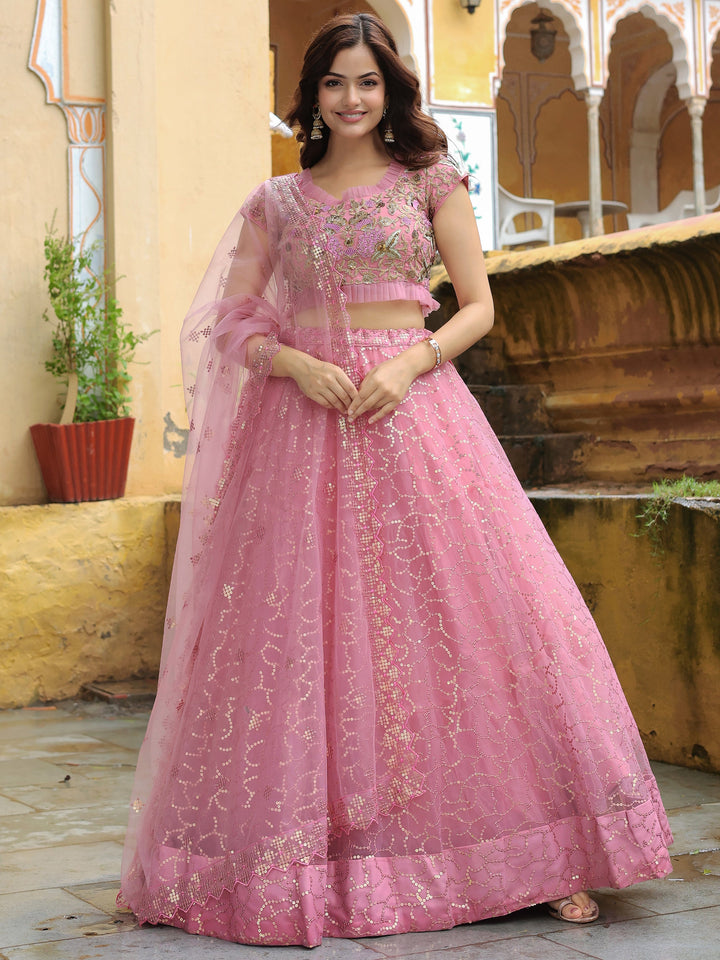 Adorable Pink Sequins Net Engagement Wear Lehenga Choli With Dupatta