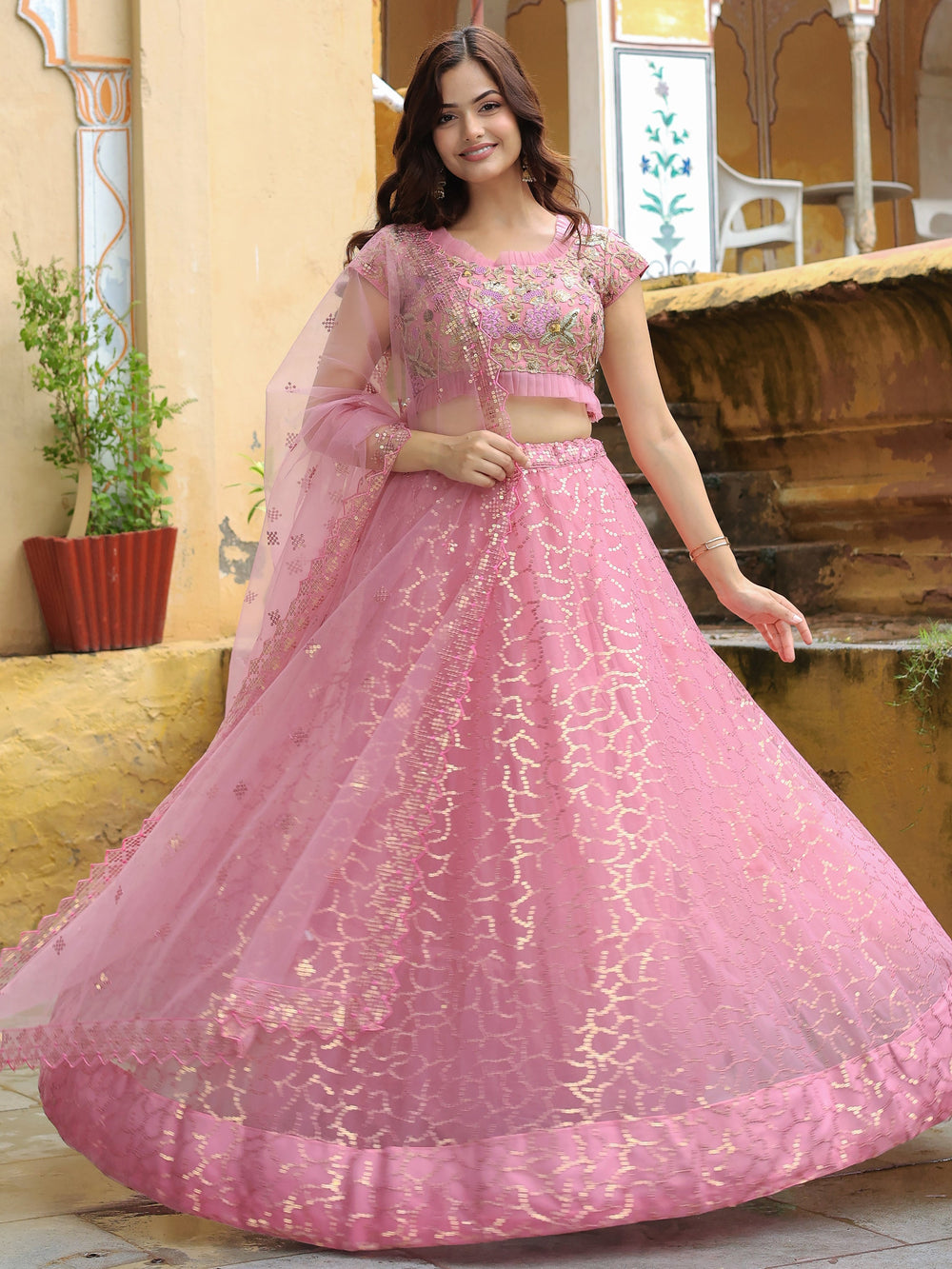 Adorable Pink Sequins Net Engagement Wear Lehenga Choli With Dupatta