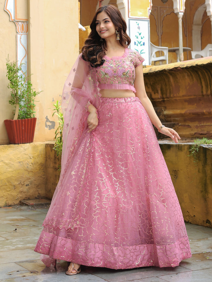 Adorable Pink Sequins Net Engagement Wear Lehenga Choli With Dupatta