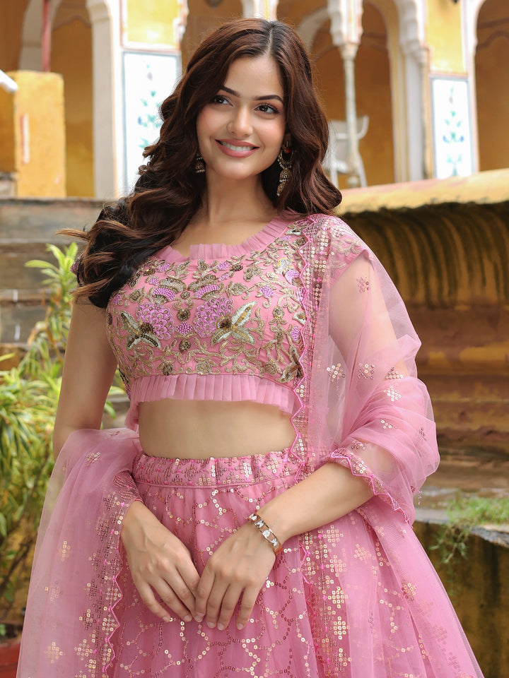 Adorable Pink Sequins Net Engagement Wear Lehenga Choli With Dupatta