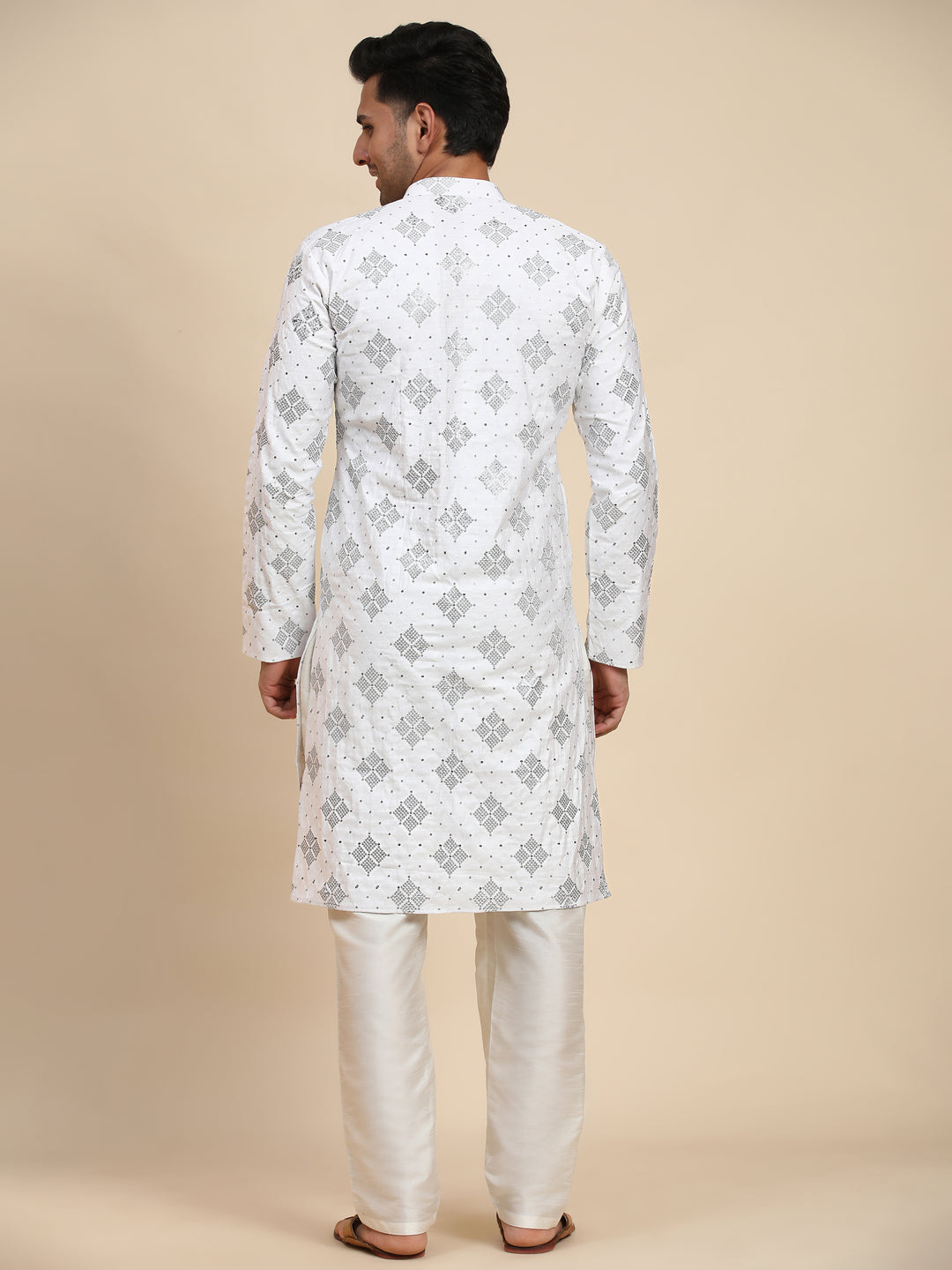 Lightweight white cotton kurta set with intricate designs, ideal for festive and casual outings in the USA.