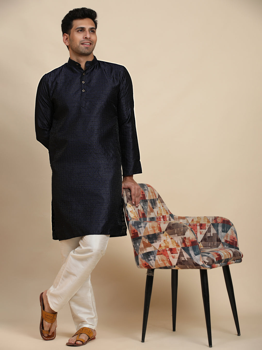 Affordable navy blue cotton kurta set under $30, combining traditional motifs with a modern twist.