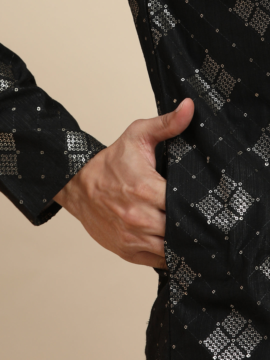 Black cotton kurta under $30, the perfect outfit for men seeking a mix of tradition and modernity.