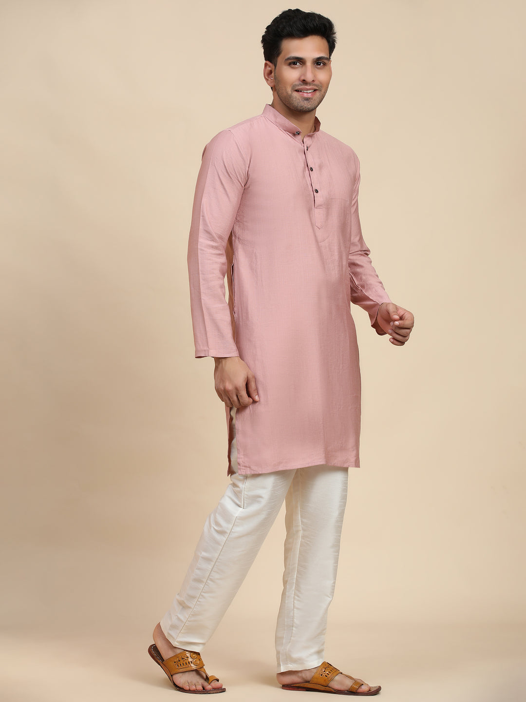 Pink cotton kurta for men, blending traditional charm with modern comfort for cultural occasions.