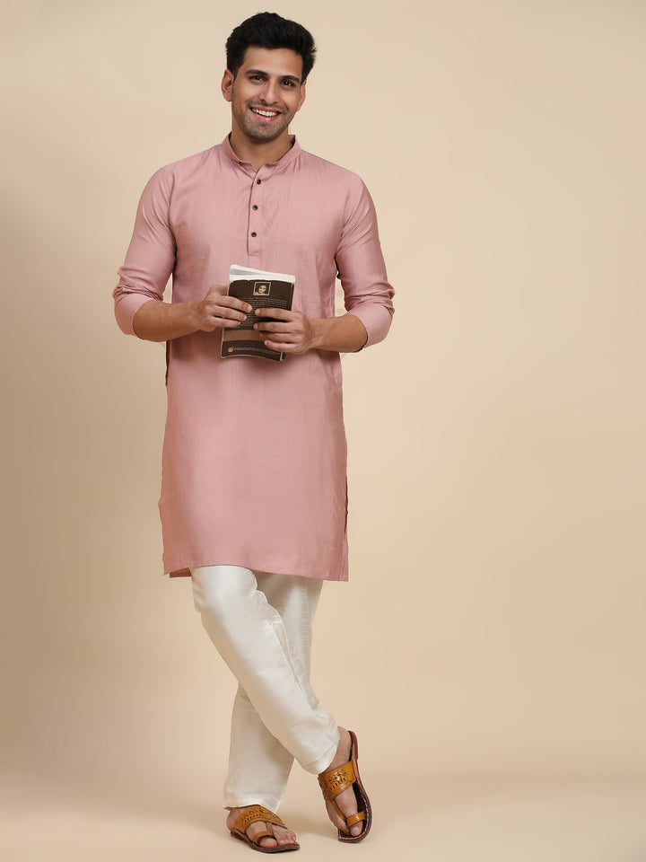 Classic pink cotton kurta for men, designed for weddings and casual wear with breathable comfort.