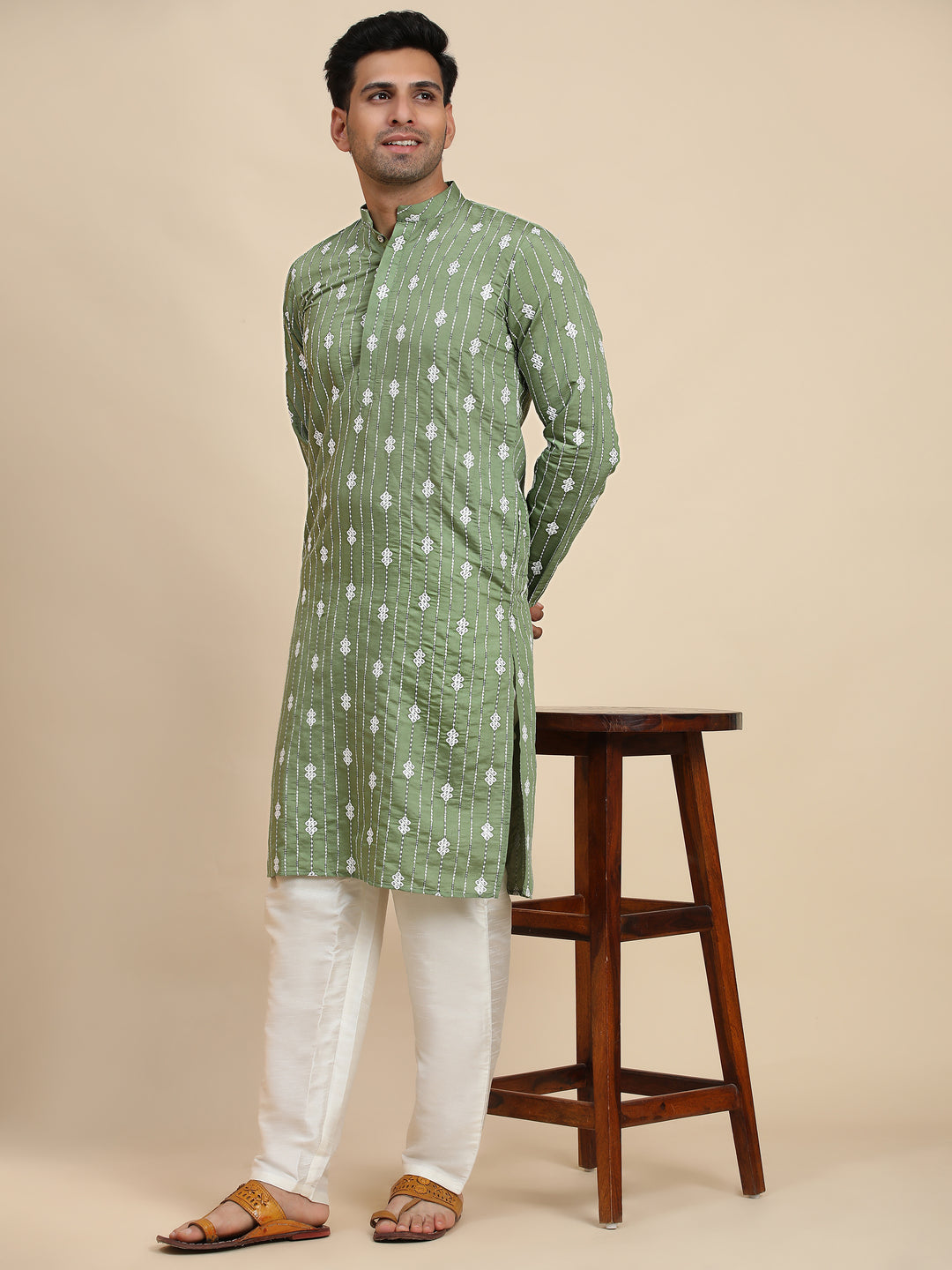 Budget-friendly green viscose rayon kurta with woven motifs great for festive celebrations and cultural occasions