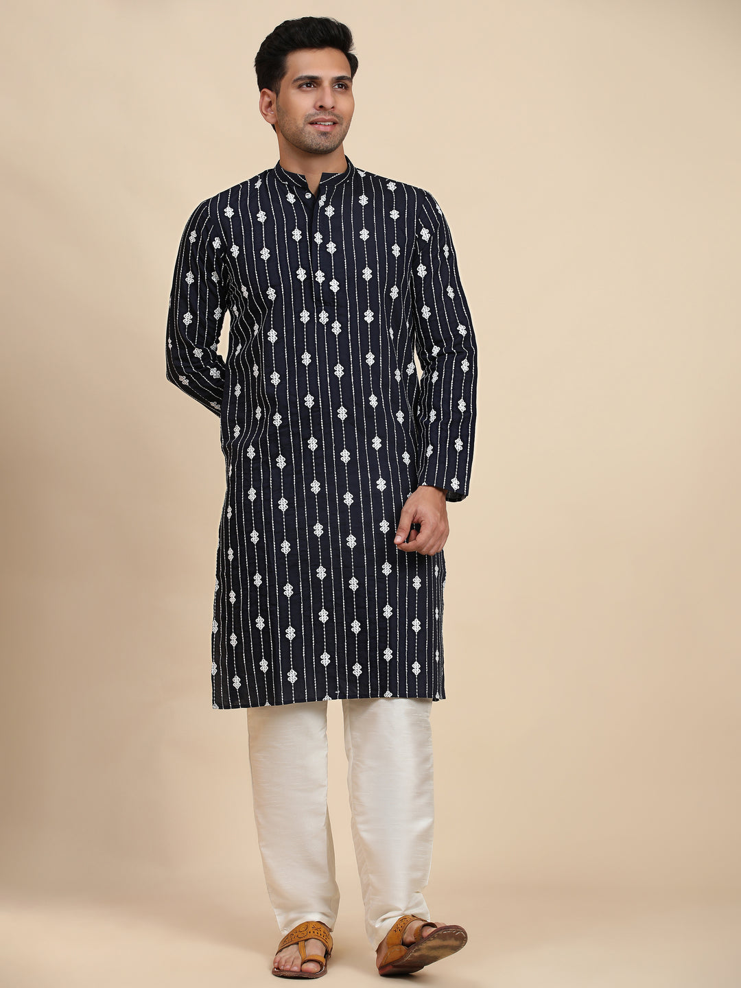 Navy blue motif kurta made from viscose rayon, ideal for pairing with cream churidar or trousers for a refined look.