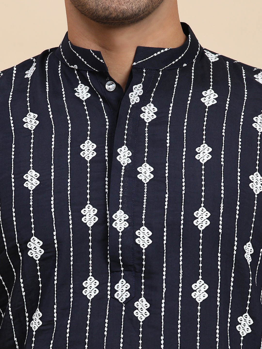 Elegant navy blue kurta with intricate weaved motifs, designed for USA-based customers seeking affordable, stylish ethnic wear.