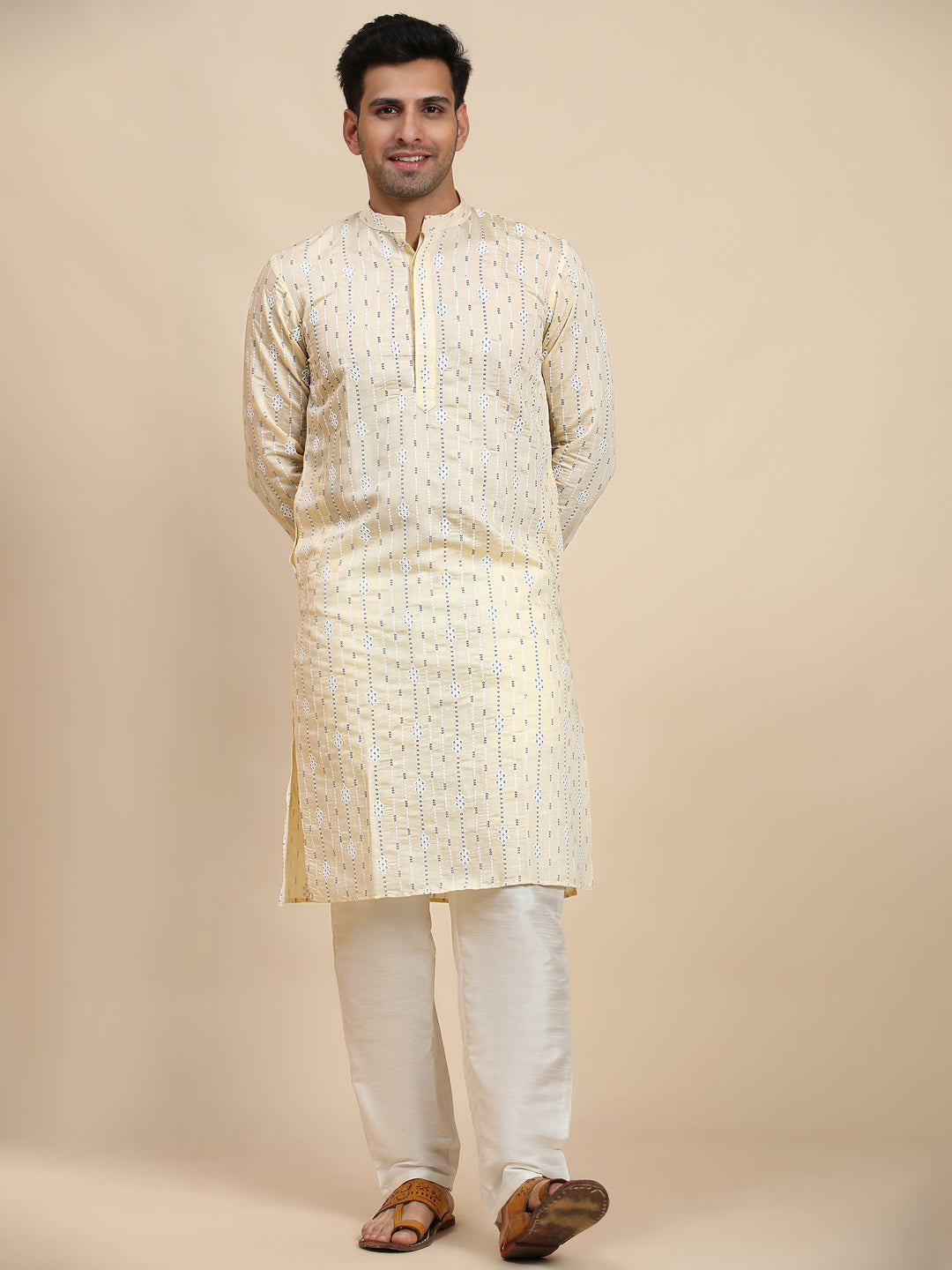 Soft and breathable cream viscose rayon kurta with traditional weaved motifs for cultural and festive events.