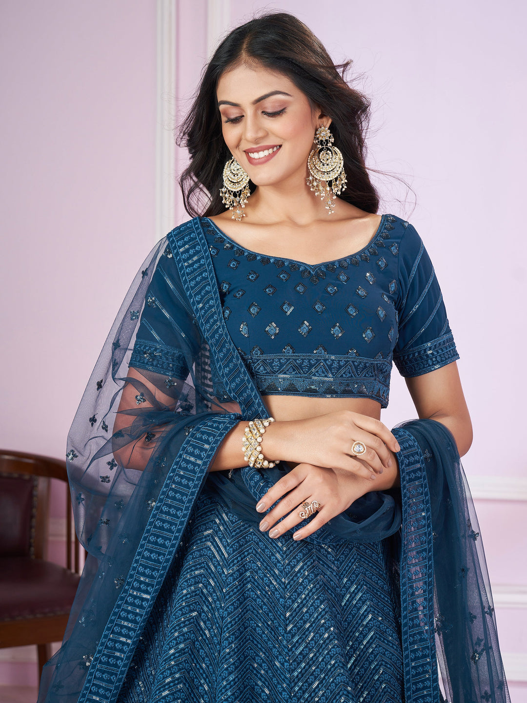 Dazzling Teal Blue Sequins Georgette Designer Lehenga Choli