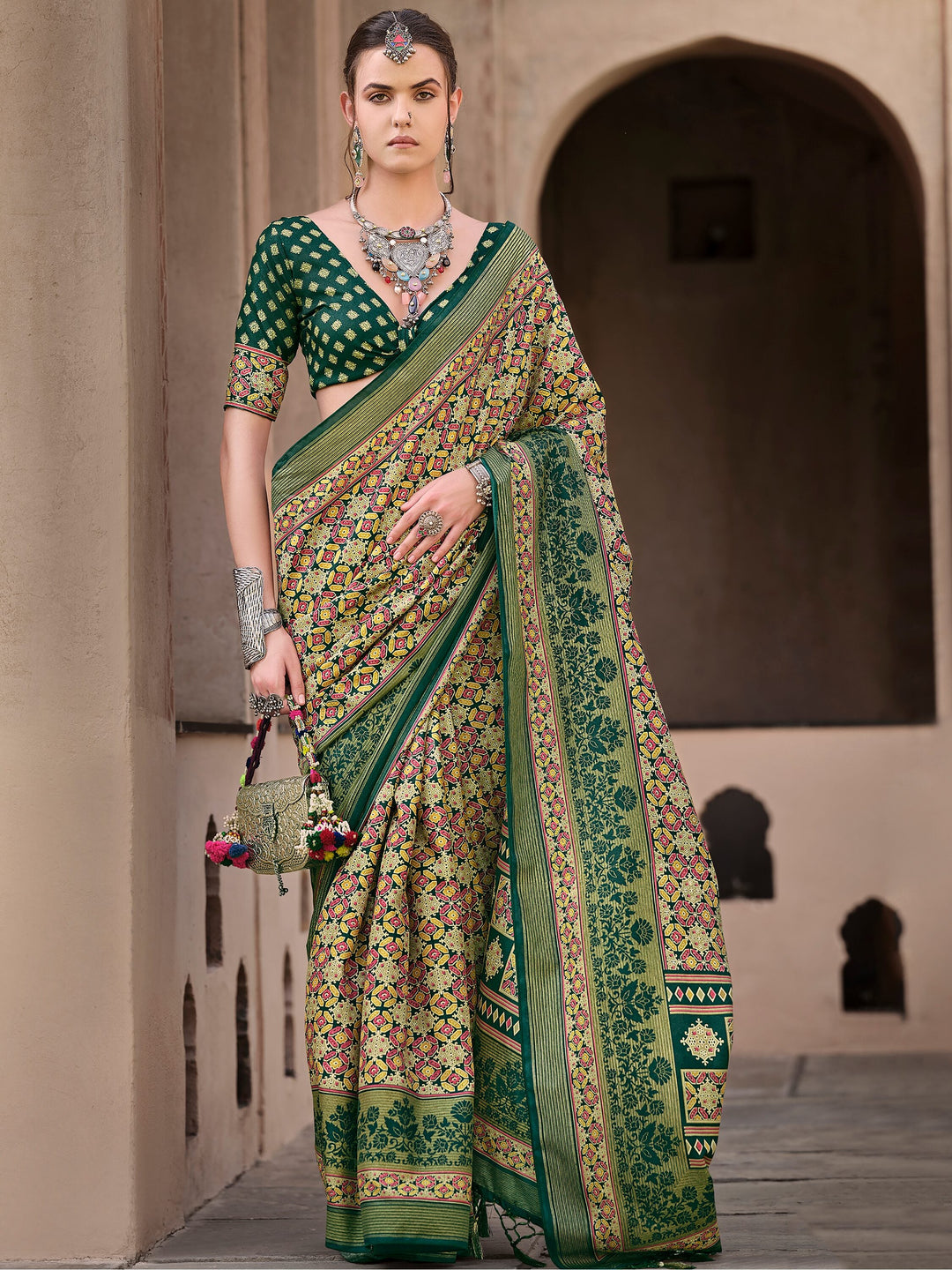 Green silk saree crafted for elegance and style.