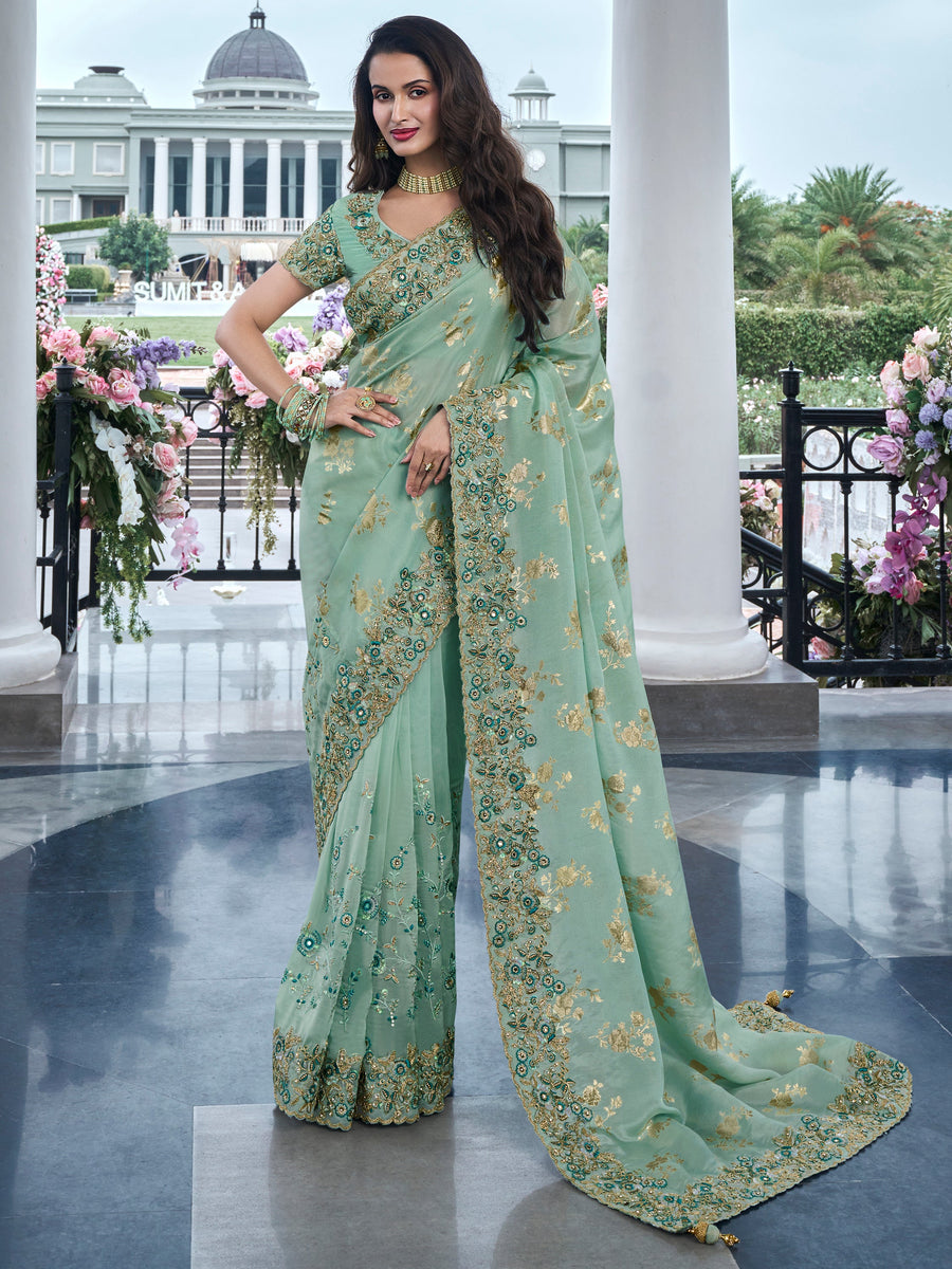 Green silk saree crafted for elegance and style.