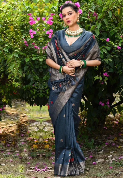 Timeless teal blue Desi tussar silk saree with zari detailing, perfect for Indian weddings.