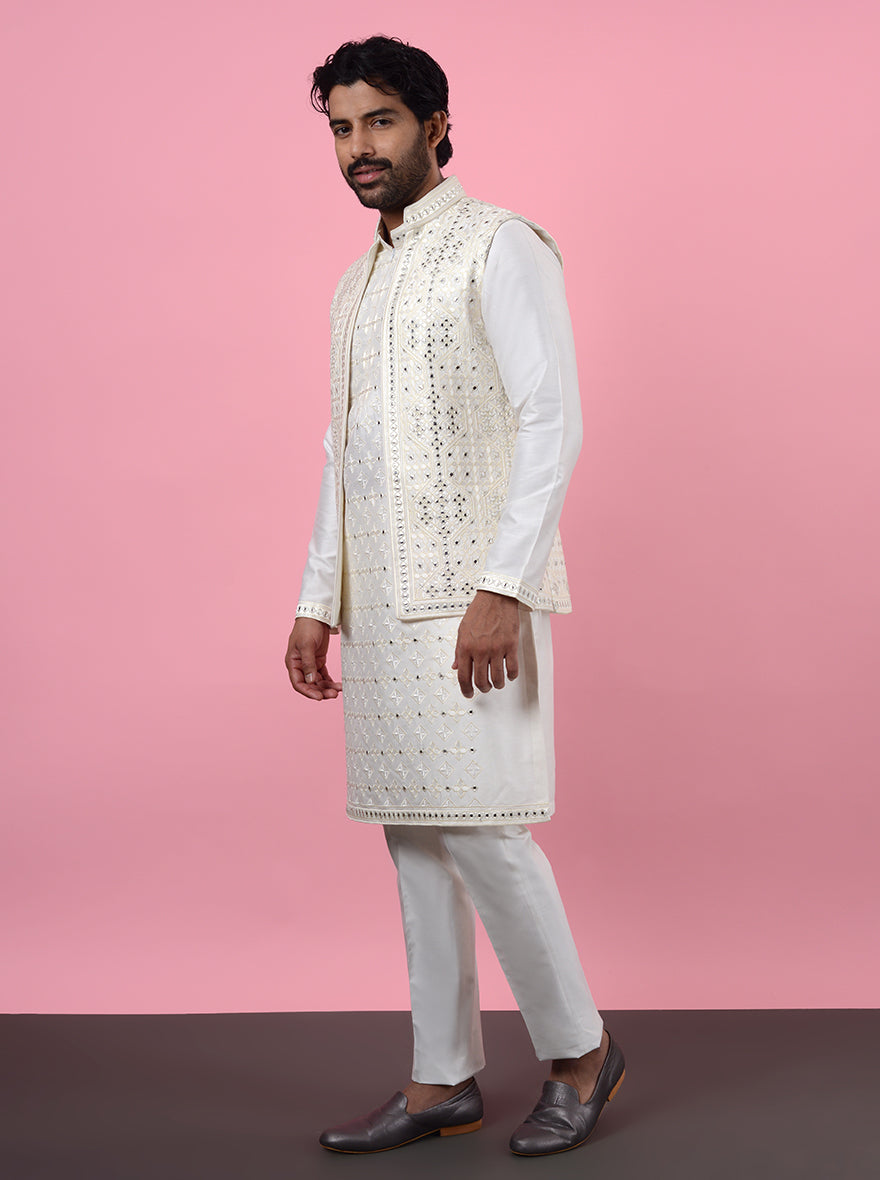 Make a statement at gatherings with this elegant Cream Kurta Set featuring a trendy Koti.