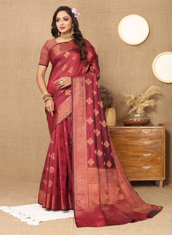 Classic maroon katan silk saree with copper zari work, complemented by a rich zari woven pallu and matching blouse piece for festivals.