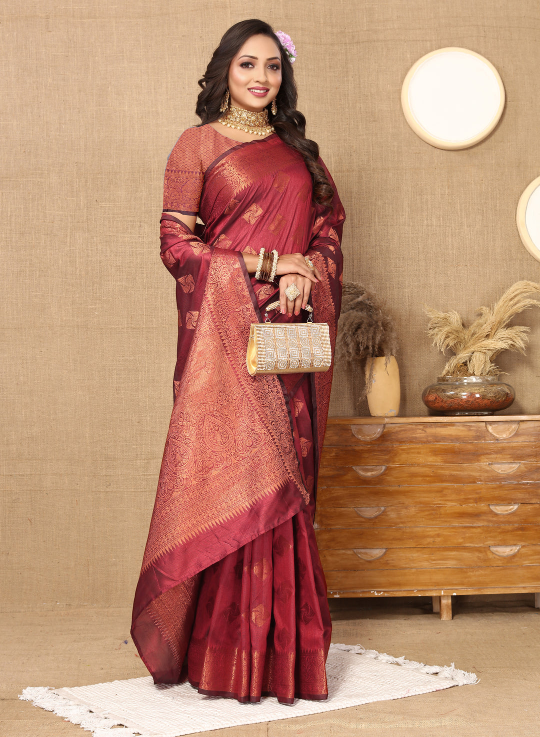 Timeless maroon katan silk saree with zari woven pallu and matching blouse piece, exuding elegance for festive occasions.