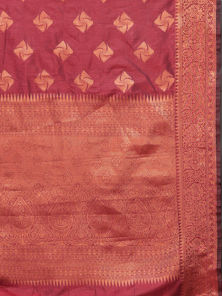 Elegant maroon katan silk saree with copper zari woven pallu and matching blouse, ideal for grand celebrations and parties.