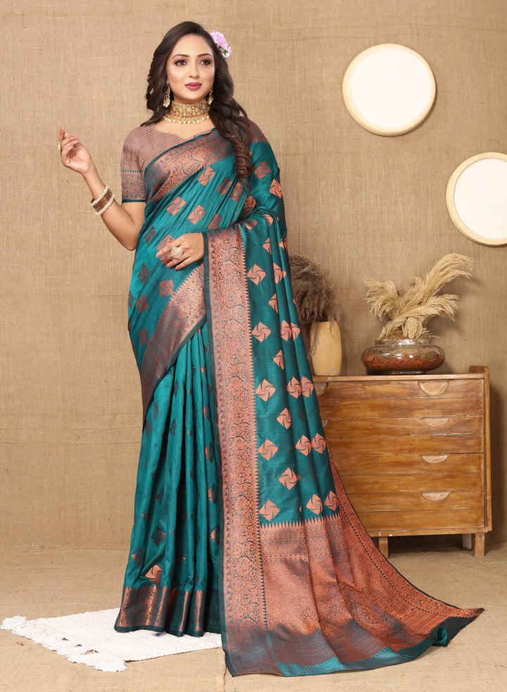 Exquisite sea blue katan silk saree featuring rich copper zari weaving, a zari woven pallu, and matching silk blouse piece.