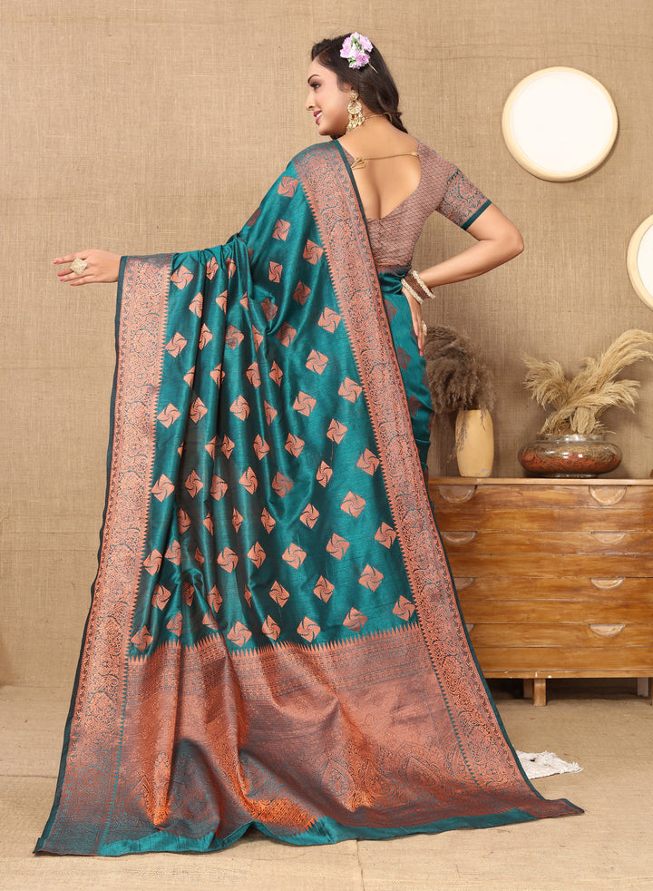 Stunning sea blue katan silk saree with intricate copper zari work and complementary zari border, ideal for festive celebrations.