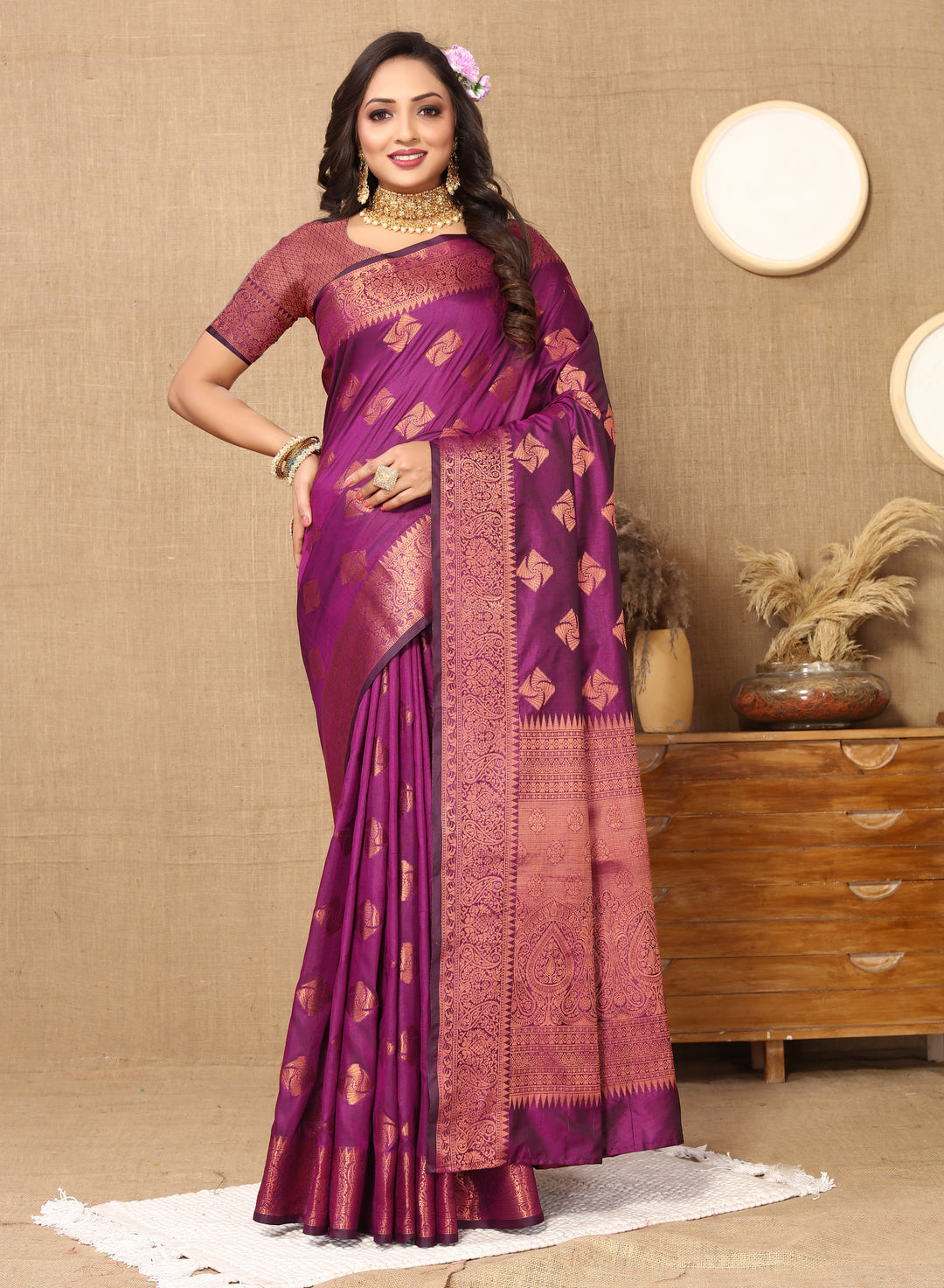 Elegant wine katan silk saree featuring intricate copper zari weaving and a zari border, perfect for weddings and grand occasions.