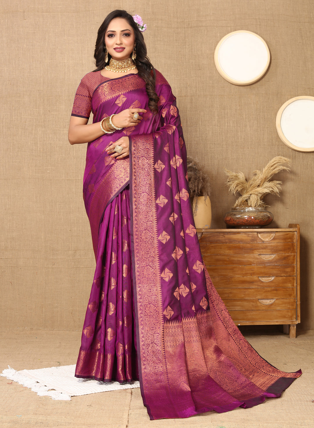 Timeless wine katan silk saree with copper zari woven pallu and matching blouse piece, ideal for special celebrations and events.