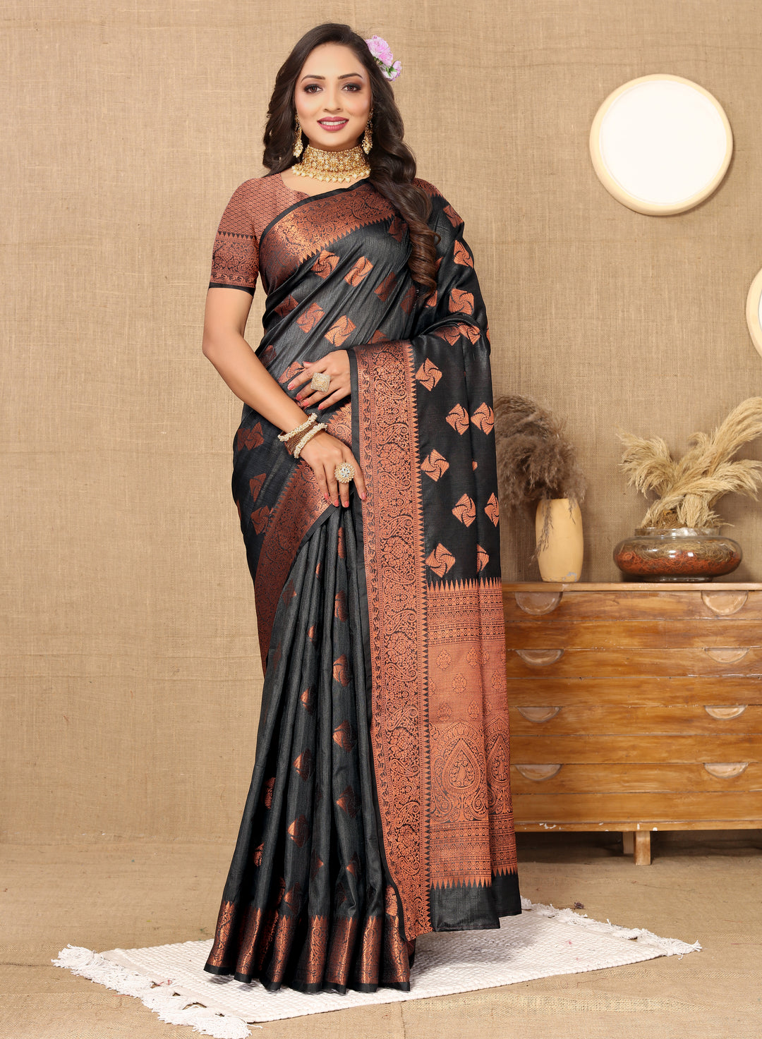 Elegant wine katan silk saree with detailed copper zari weaving and matching blouse piece, designed for festive occasions.