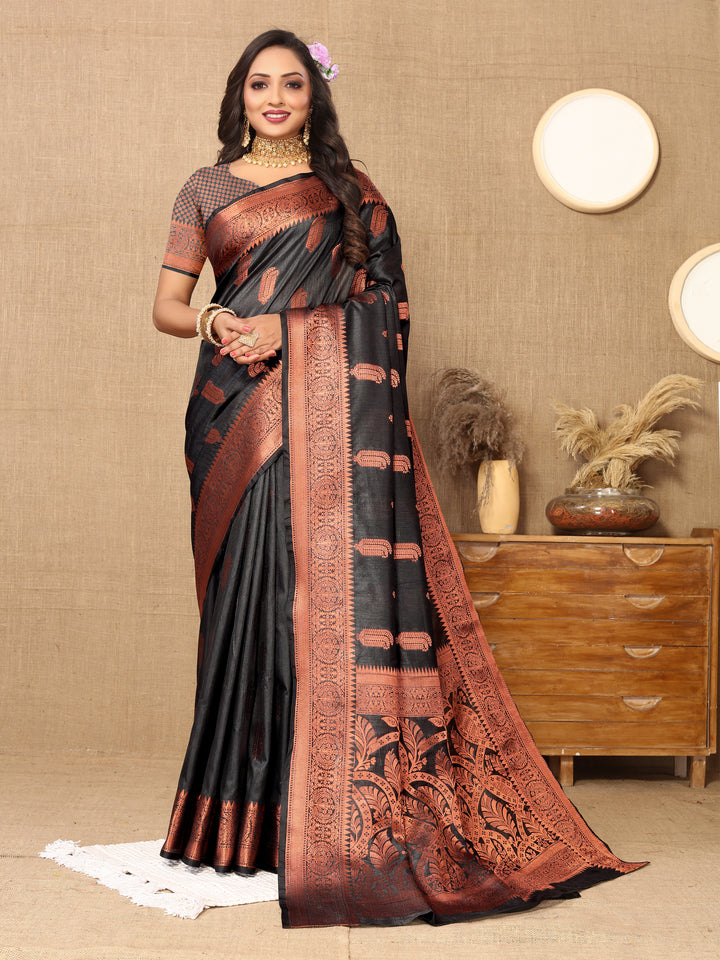 Luxurious black silk saree with beautiful zari border, perfect for festive and cultural events.