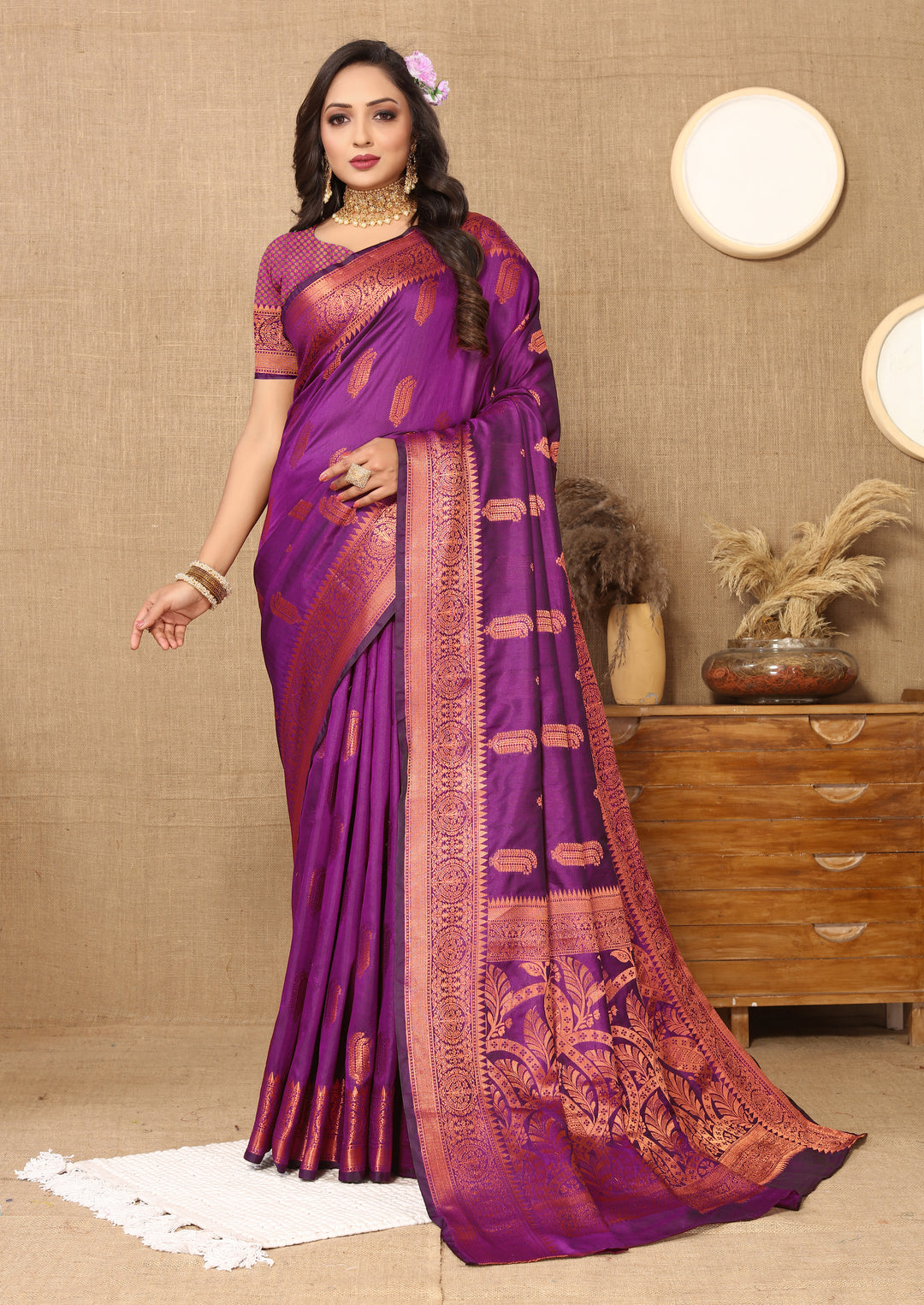 Timeless purple silk saree featuring intricate zari border, perfect for formal and festive gatherings.