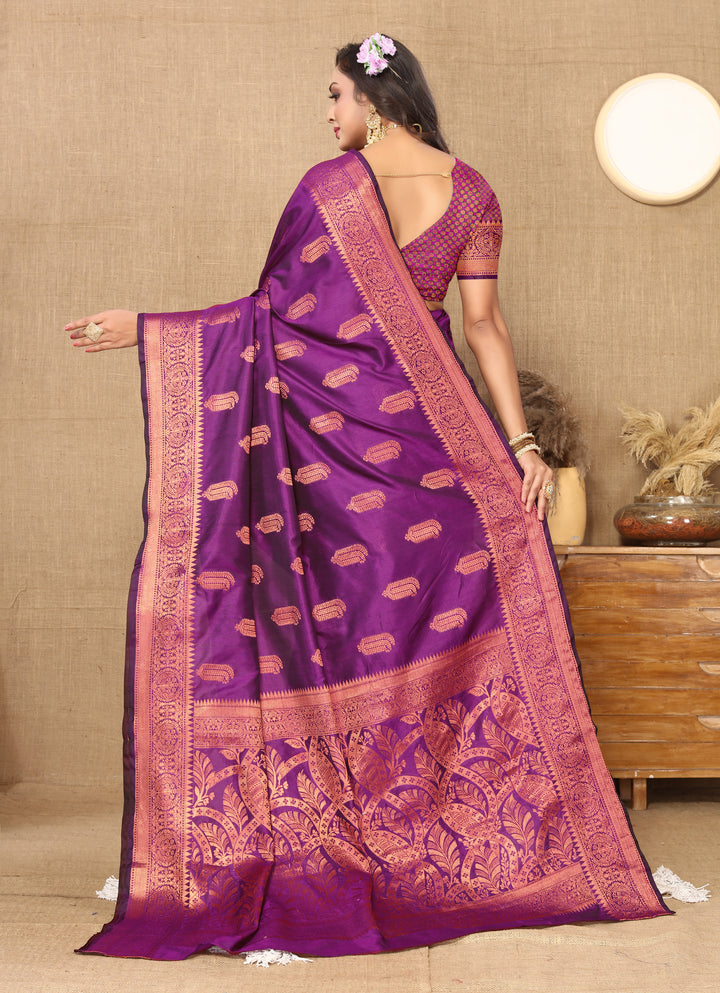 Purple silk saree with intricate zari weaving, ideal for weddings and cultural events.