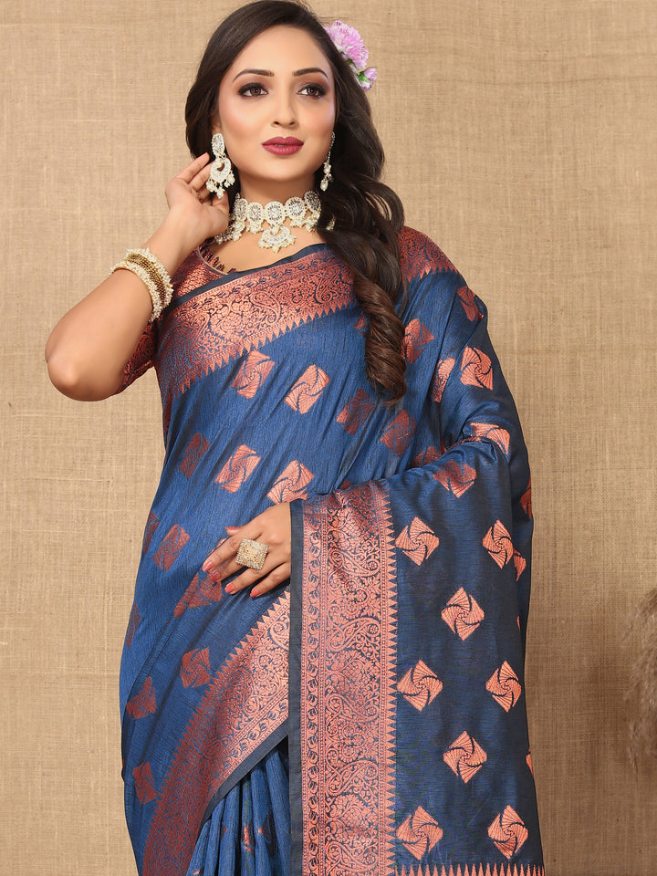 Regal navy katan silk saree featuring intricate copper zari weaving and matching blouse piece, ideal for weddings and festivals.