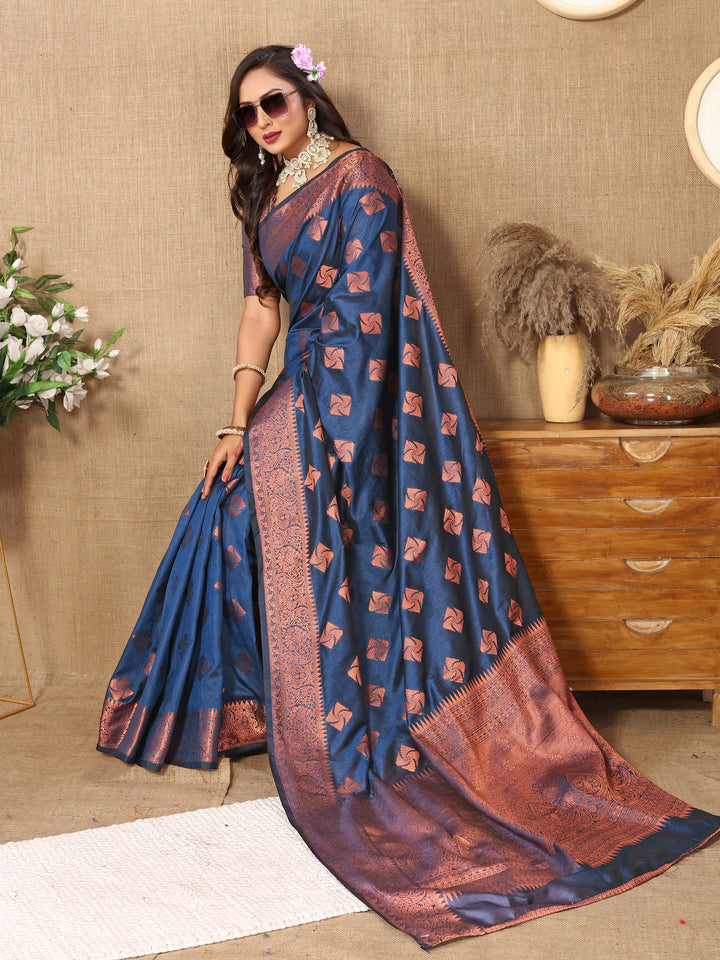 Rich navy katan silk saree with intricate copper zari work and matching blouse piece, perfect for grand celebrations and weddings.