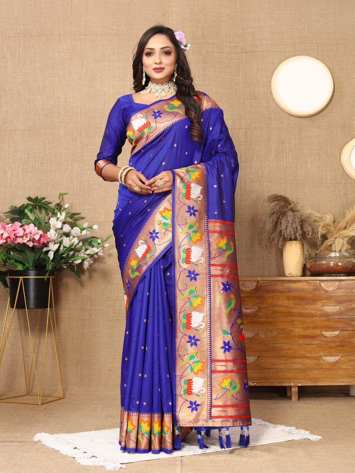 Royal-blue Paithani silk saree with intricate meenakari weaving and a zari border, perfect for festive occasions.