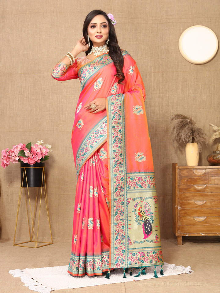 Peach Paithani silk saree with elegant zari border and tassels, perfect for festive occasions.