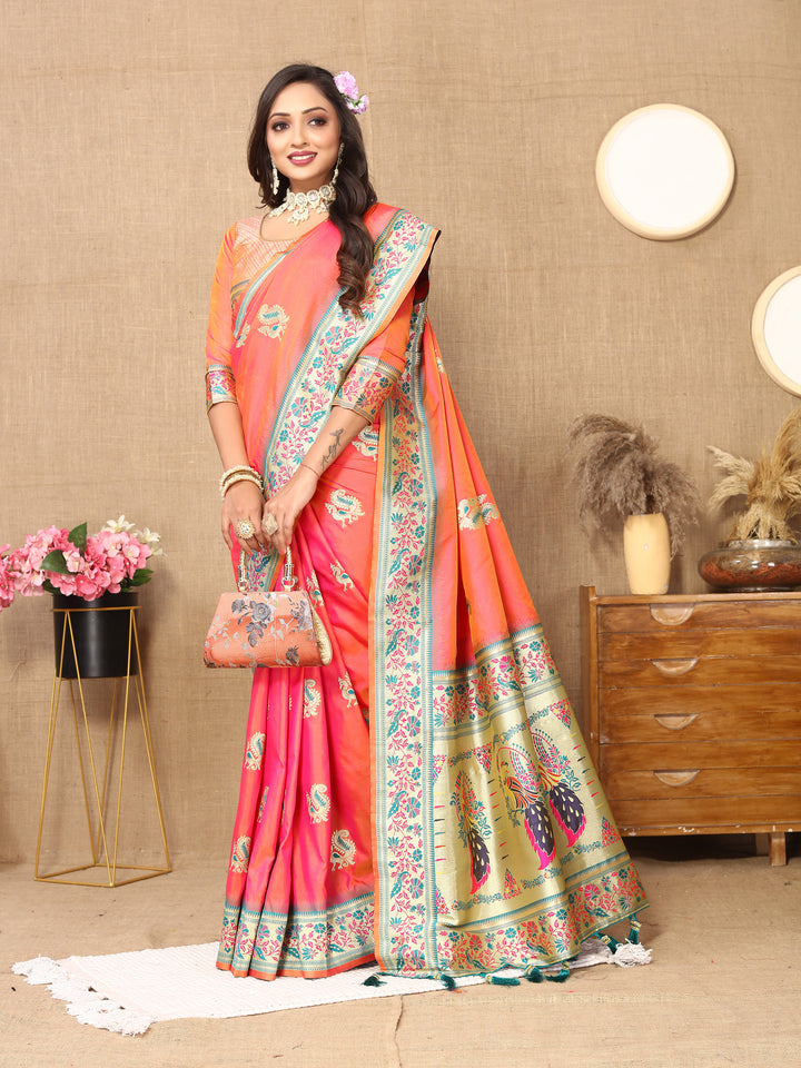 Designer peach Paithani saree with stylish zari border and tassels, perfect for Indian ceremonies.