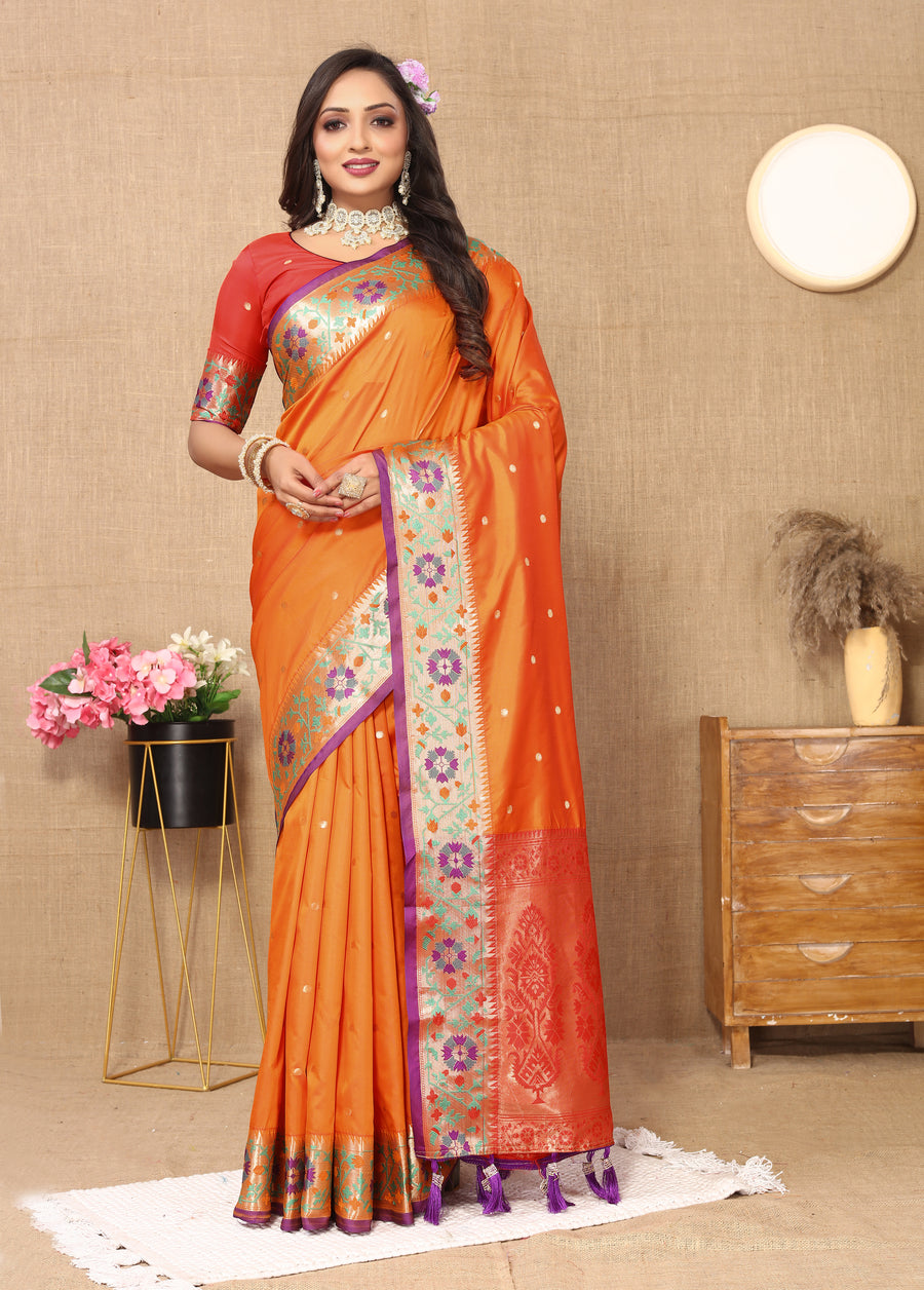 Elegant orange Paithani silk saree with intricate Meenakari weaving and a beautiful zari pallu.