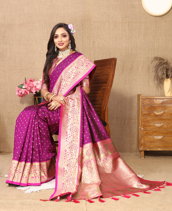 Rich Purple Soft Silk Saree with zari weaving and an elegant brocade blouse for celebrations.