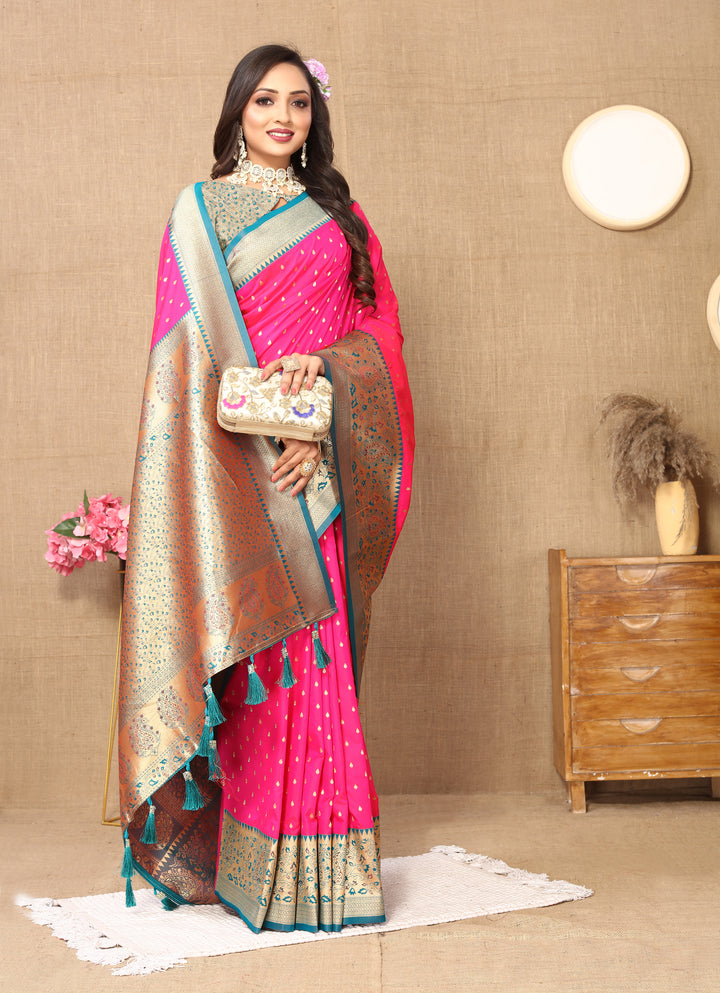 Radiant Pink Soft Silk Saree featuring detailed zari weaving and a rich brocade blouse.