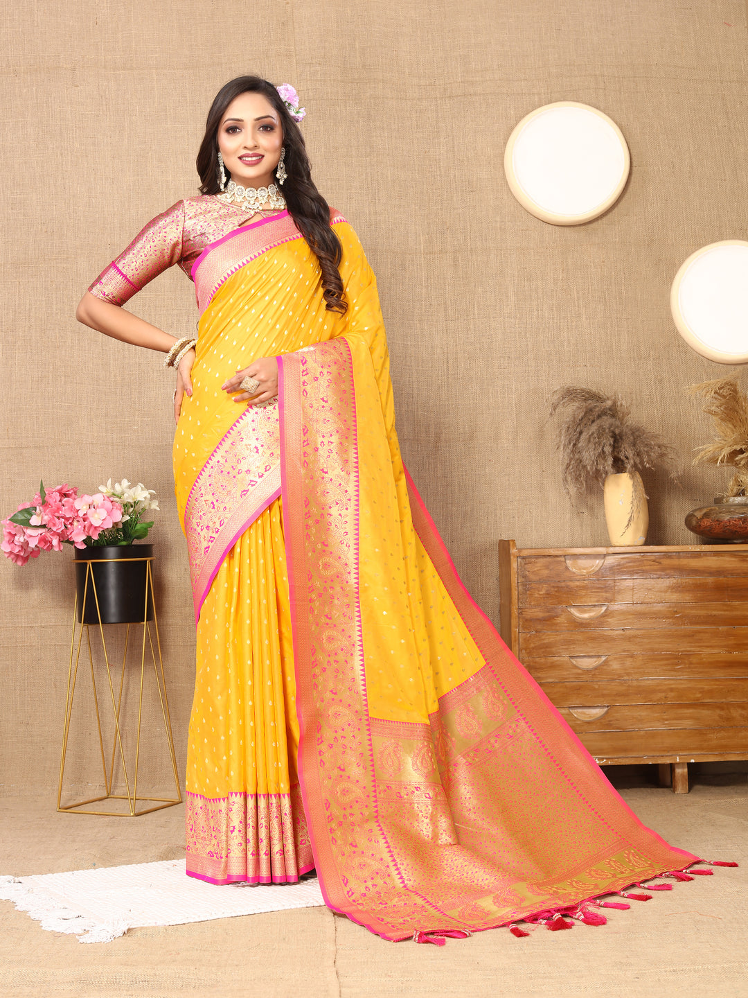 Gorgeous Yellow Soft Silk Saree featuring intricate zari weaving and a luxurious brocade blouse.