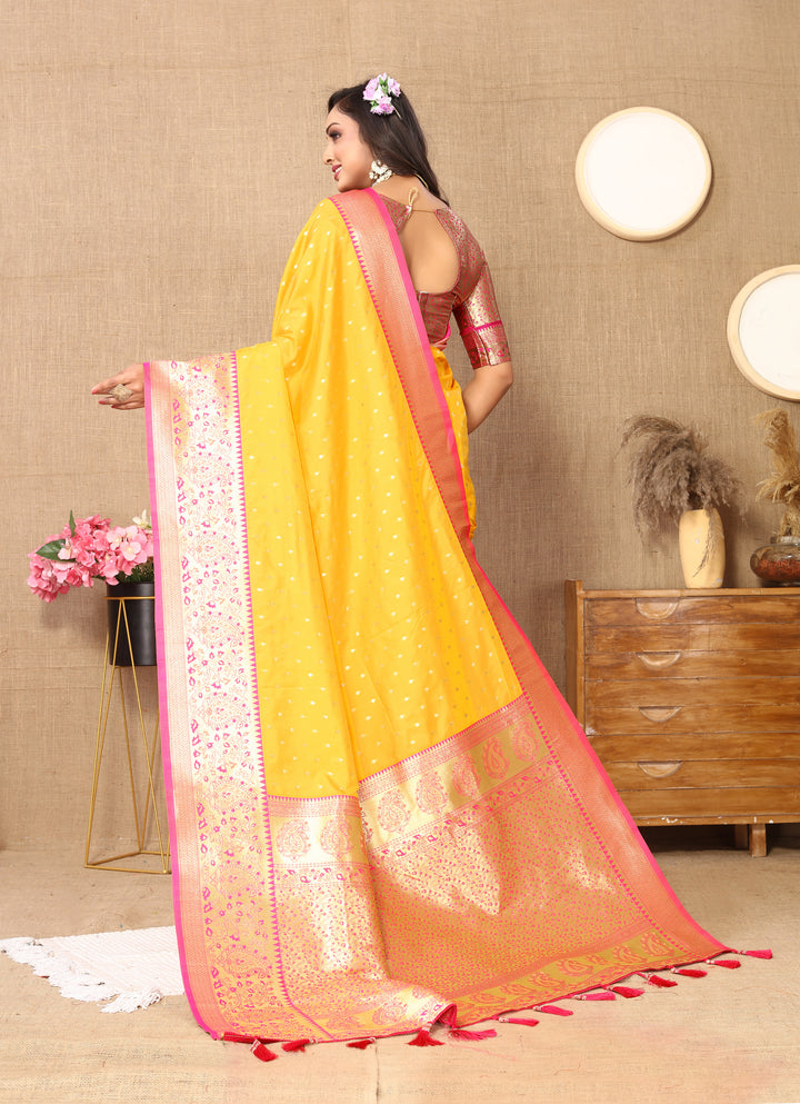 Yellow Refined Soft Silk Saree with detailed zari weaving and a brocade blouse, perfect for weddings.