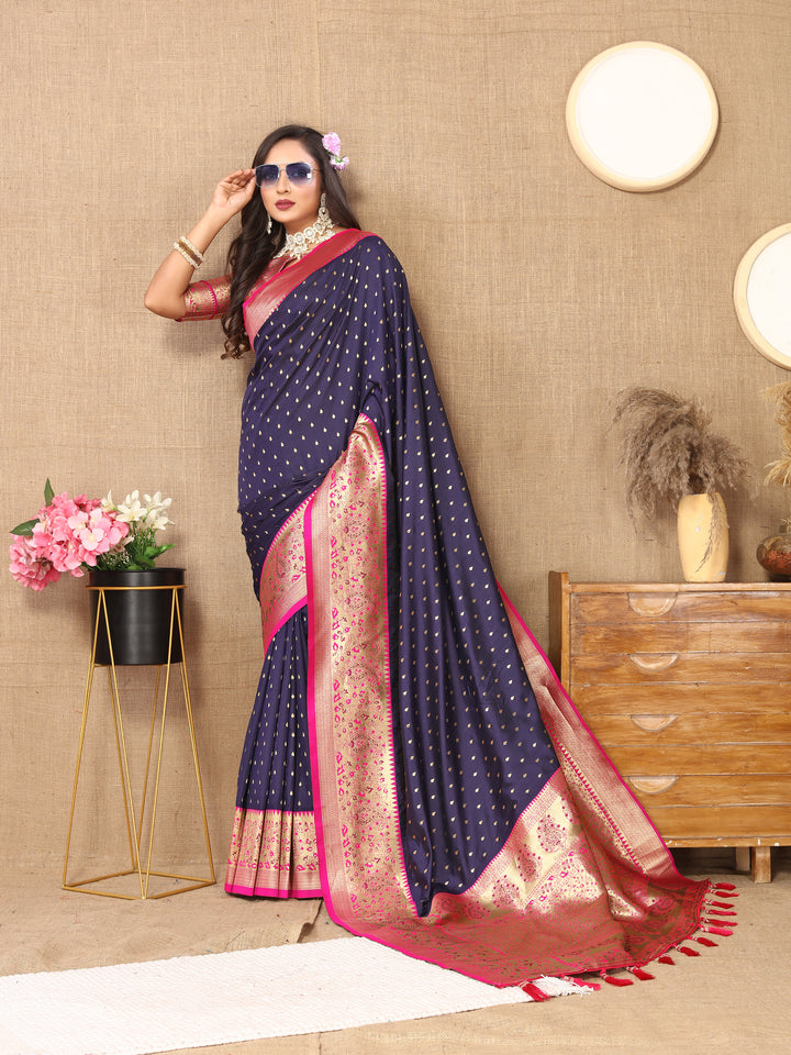 Premium Navy Silk Saree with detailed zari weaving and a stunning brocade blouse for grand events.