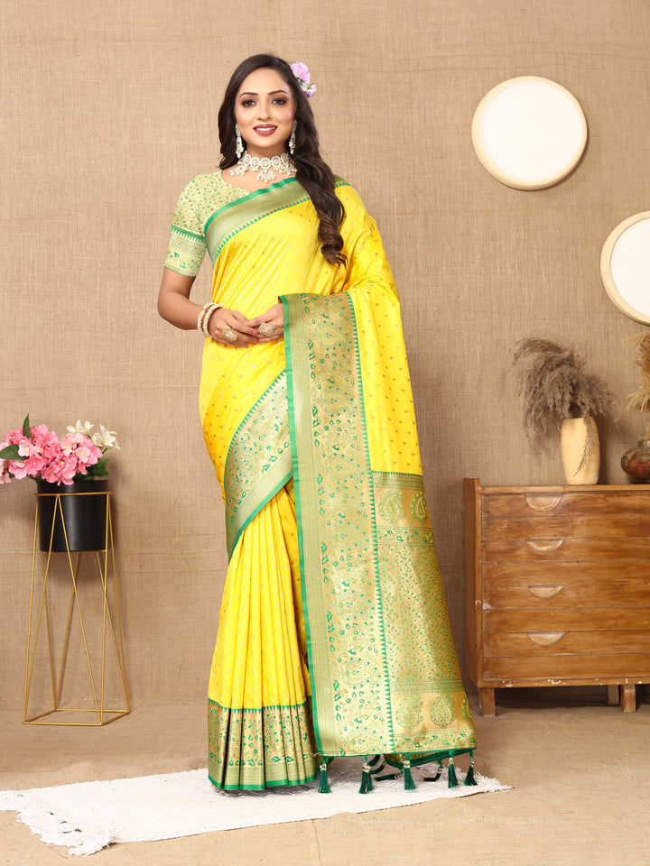 Premium Rama Soft Silk Saree with intricate zari design and a brocade blouse for special occasions.