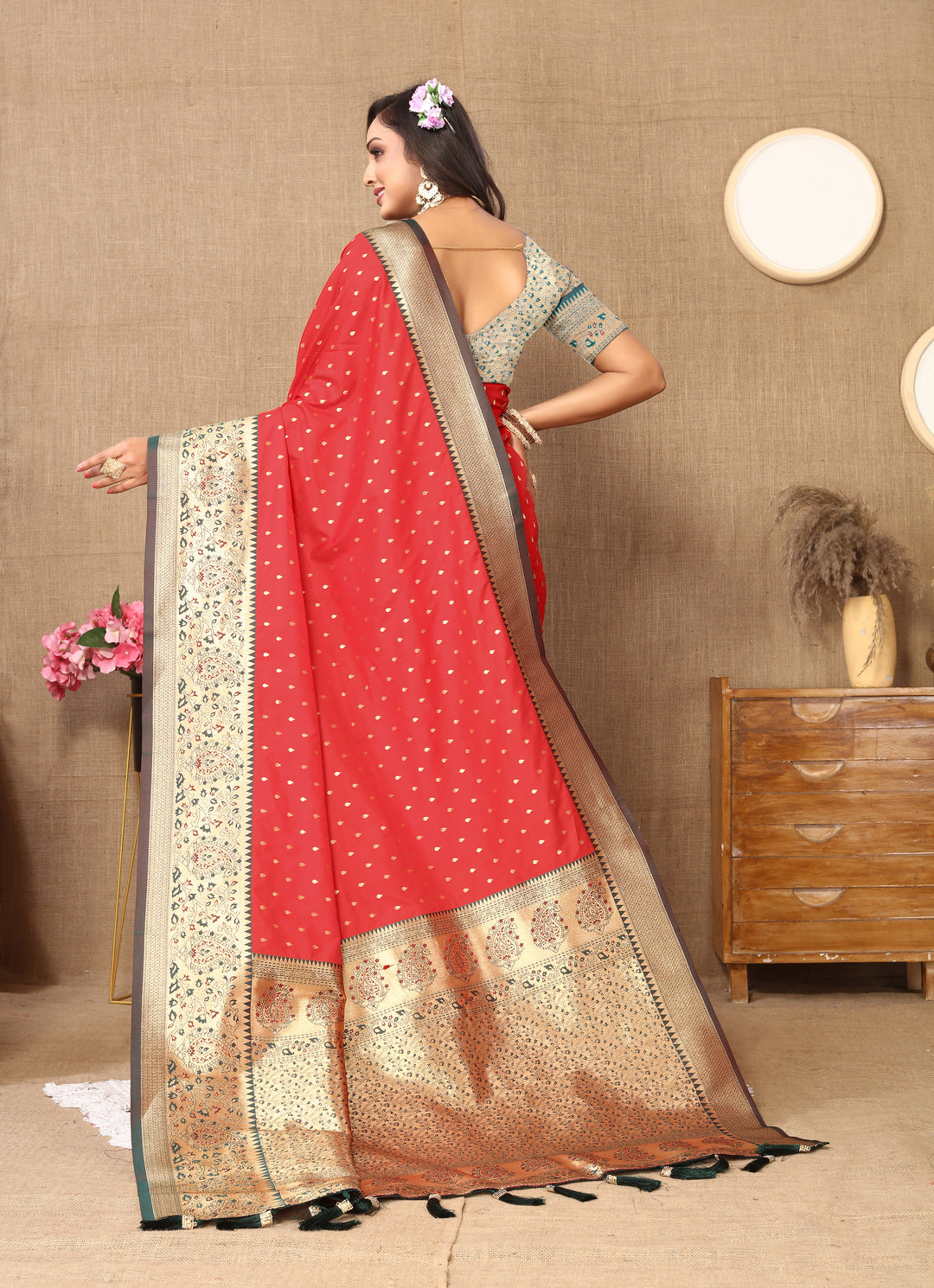 Bold Red Soft Silk Saree with intricate zari weaving and a luxurious brocade blouse for weddings.